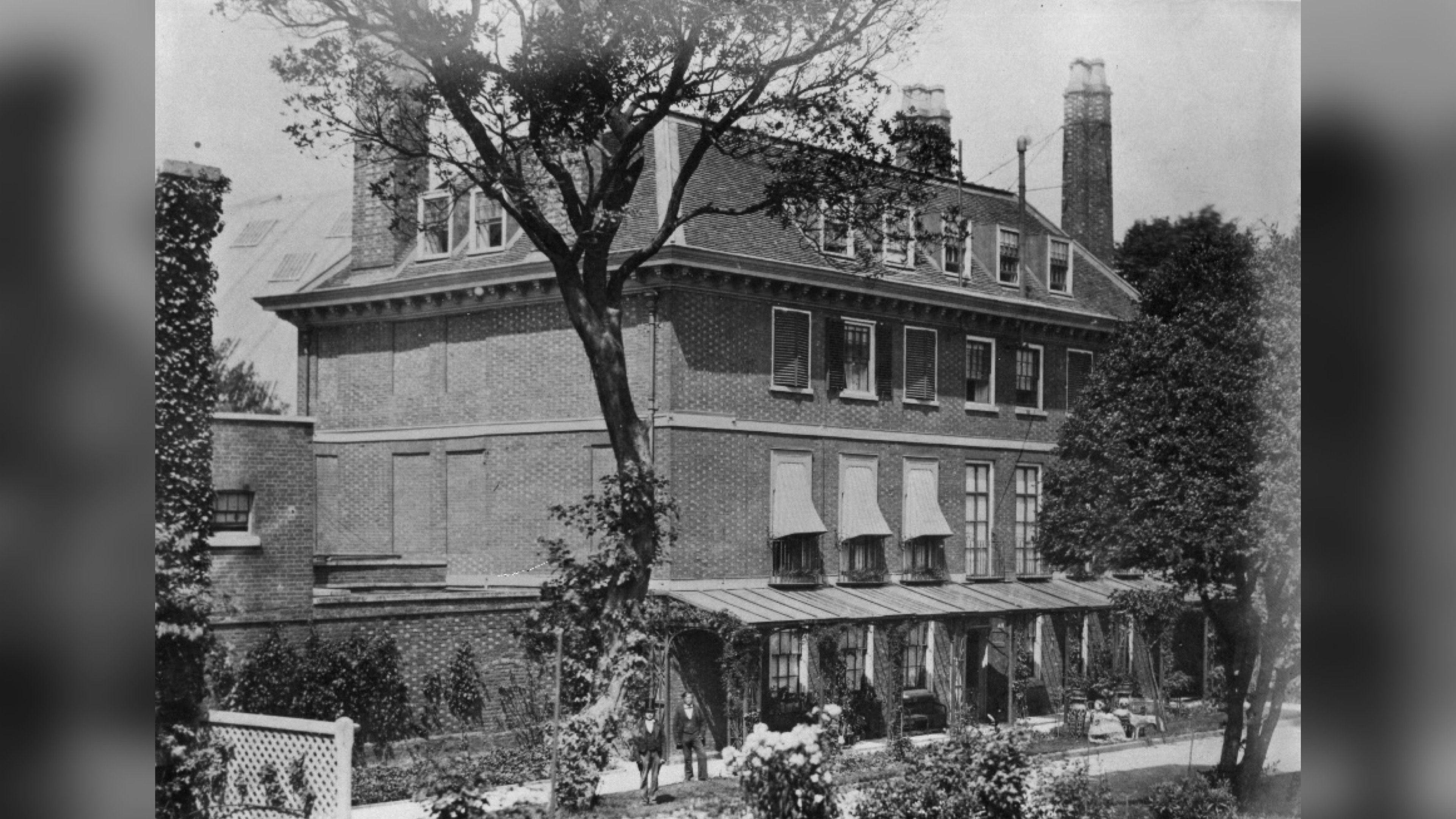 Historic black and white photograph of the Commissioner's House at Chatham Historic Dockyard