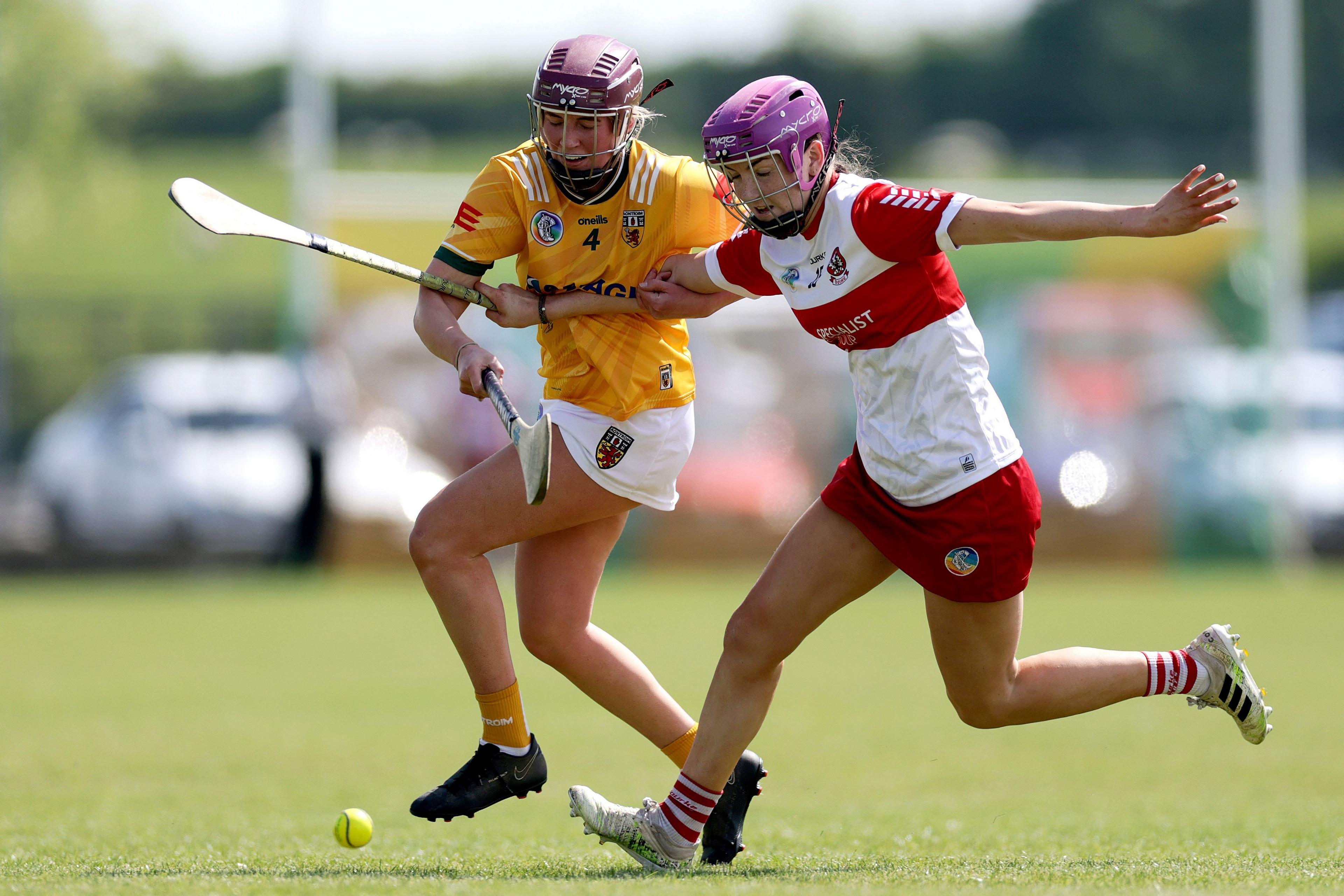 Derry's Orlaith Hull battles with Antrim's Caoimhe McNaughton at Dunloy