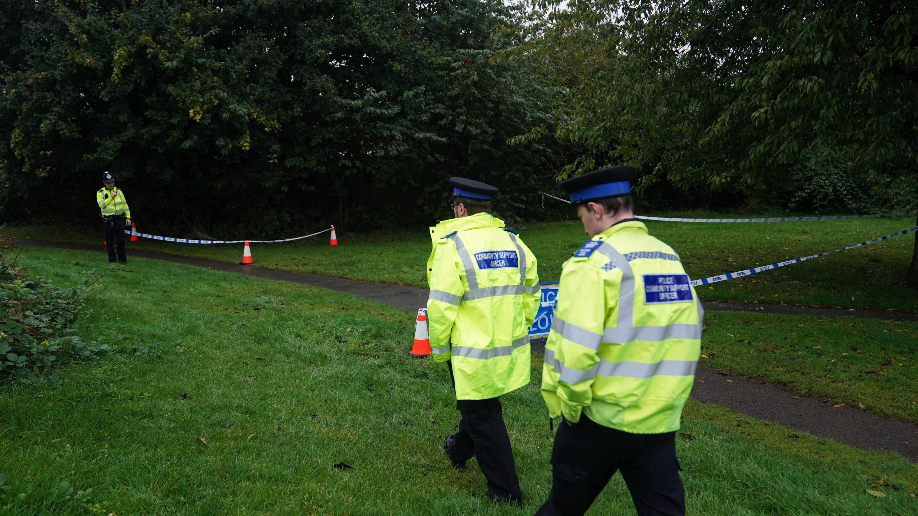 Three police officers at the scene in Franklin Park