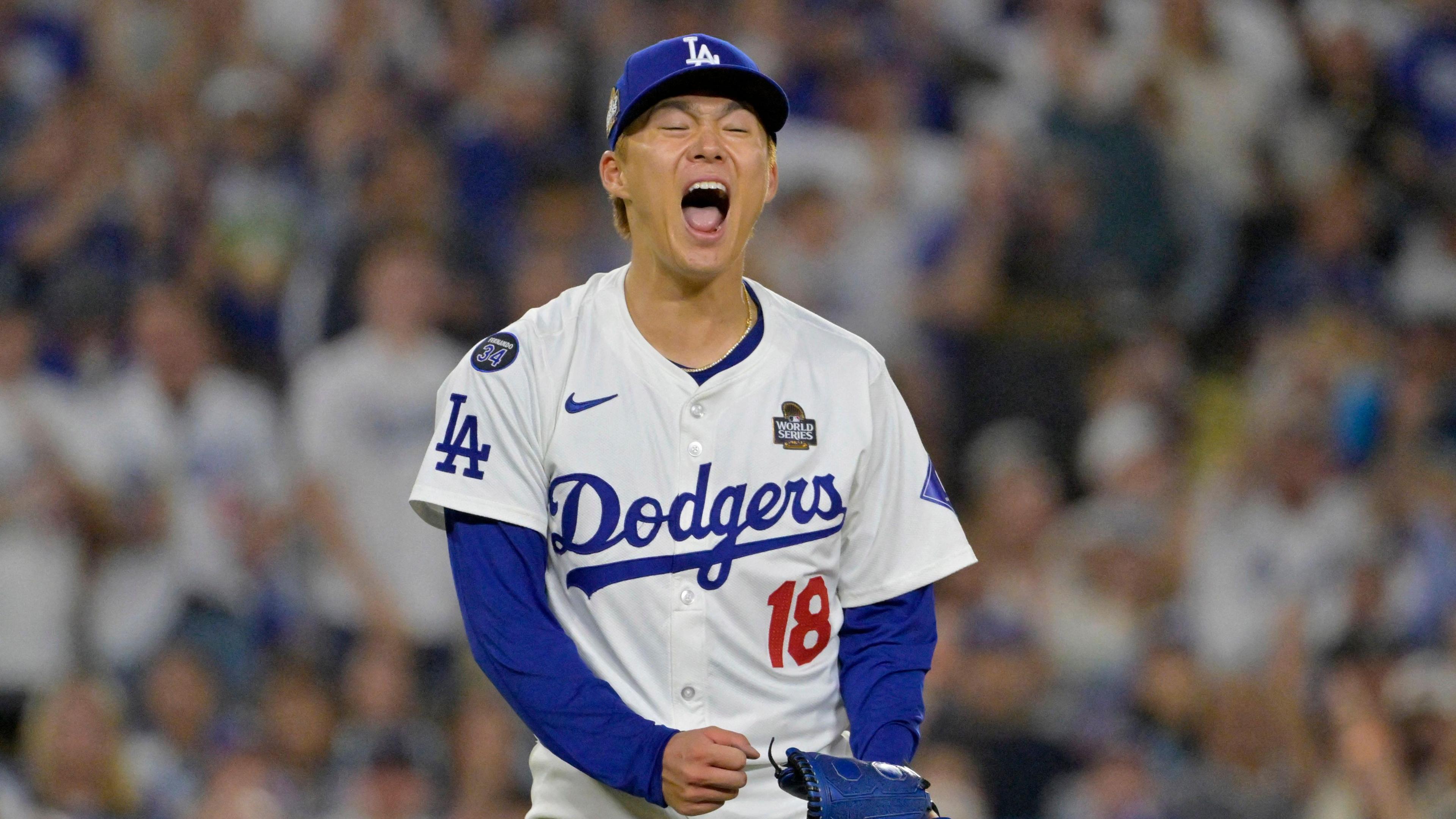 Los Angeles Dodgers pitcher Yoshinobu Yamamoto celebrates