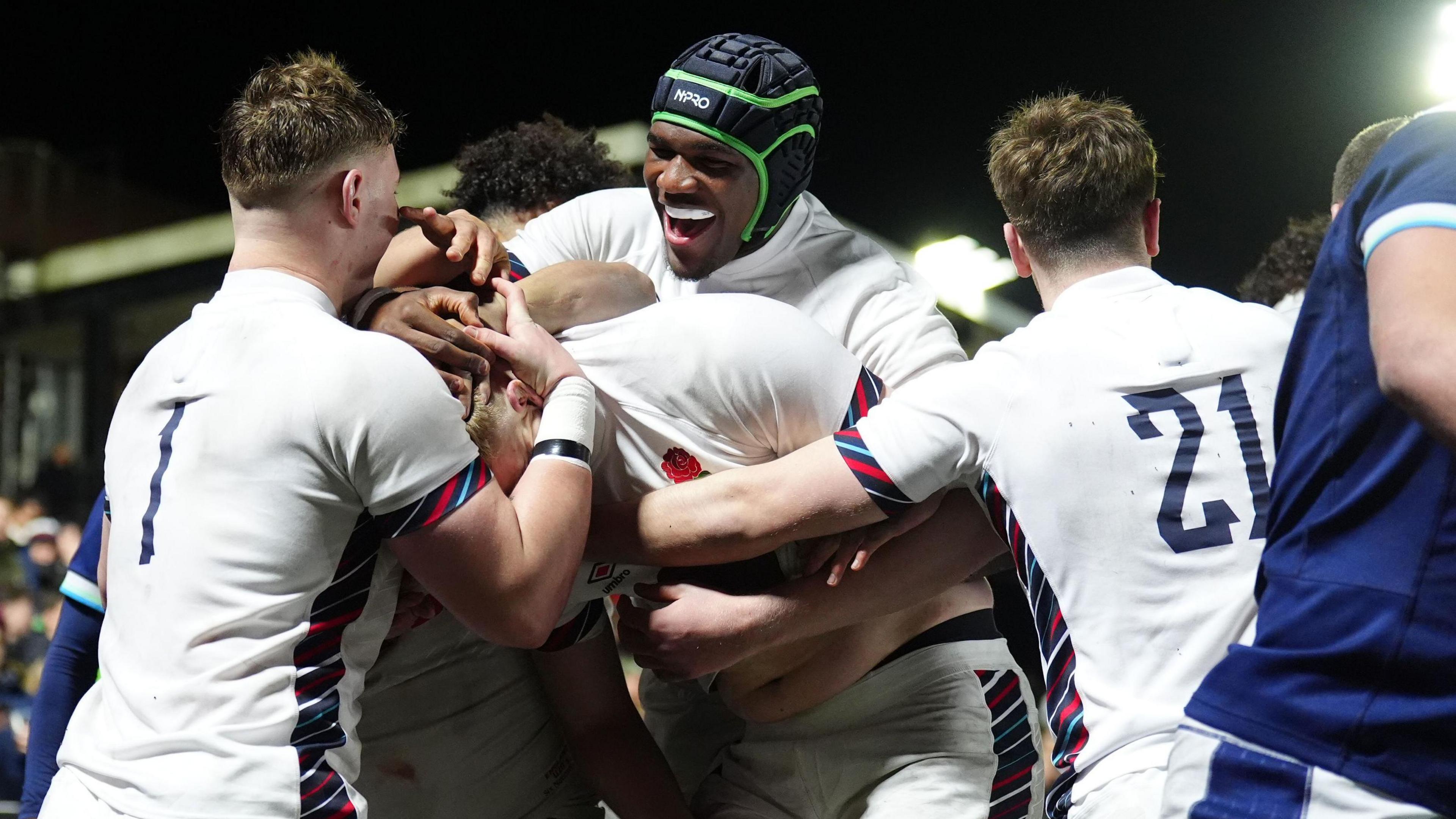 England players celebrate a try 