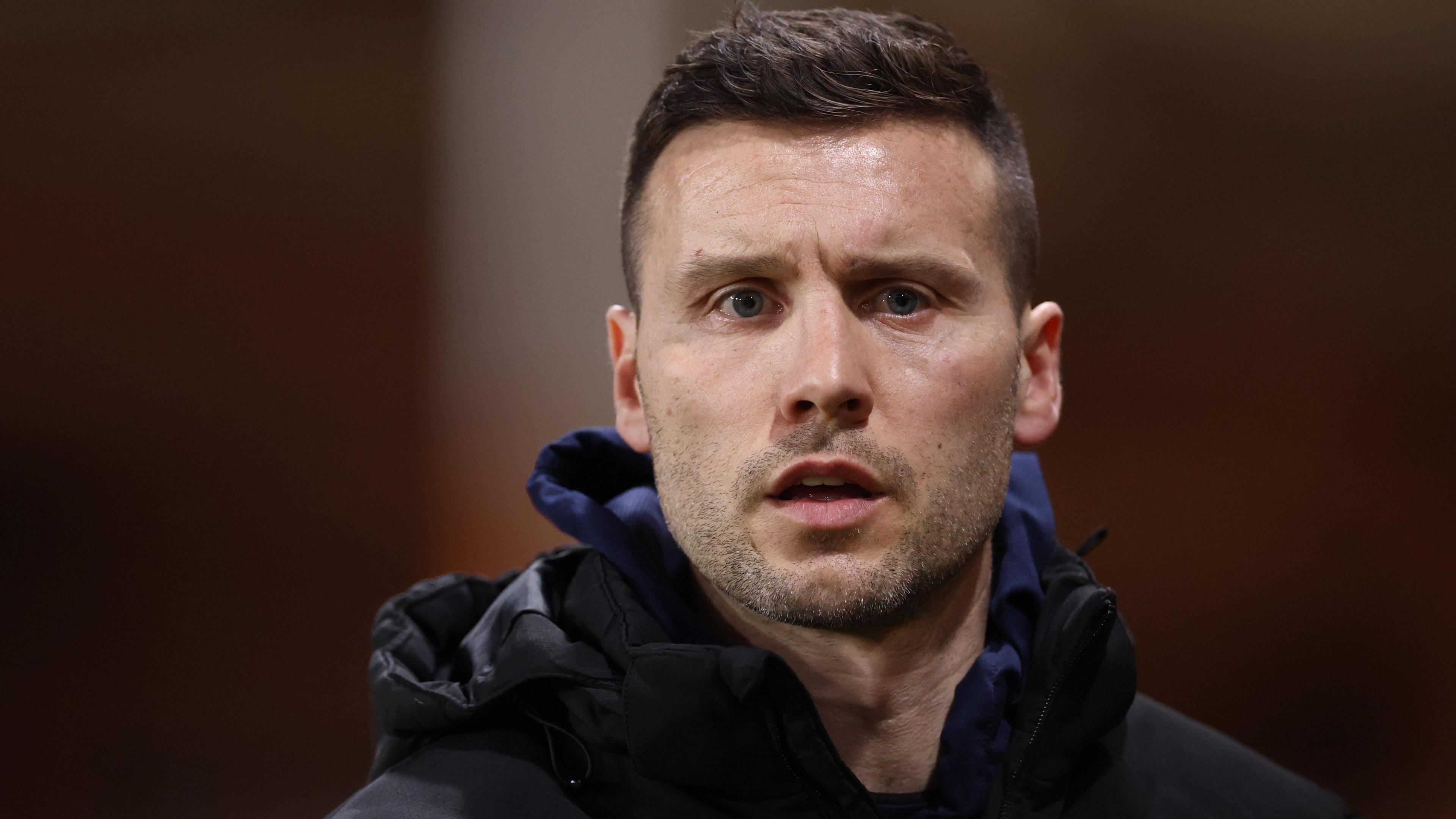 Mat Sadler on the touchline