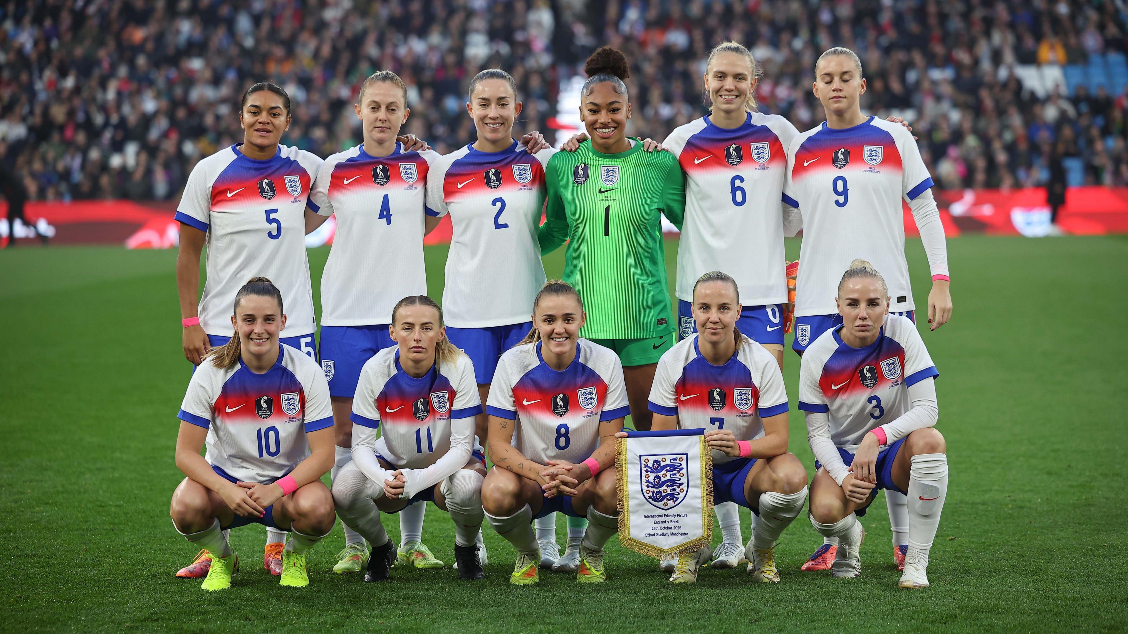 England line up before the friendly with China