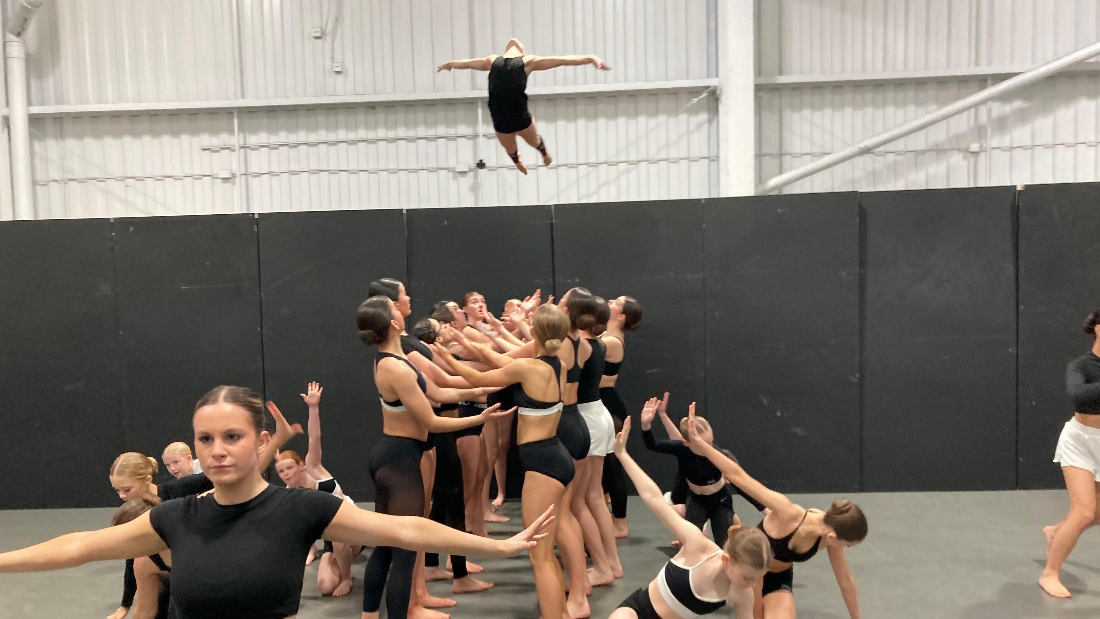 The dance group rehearsing