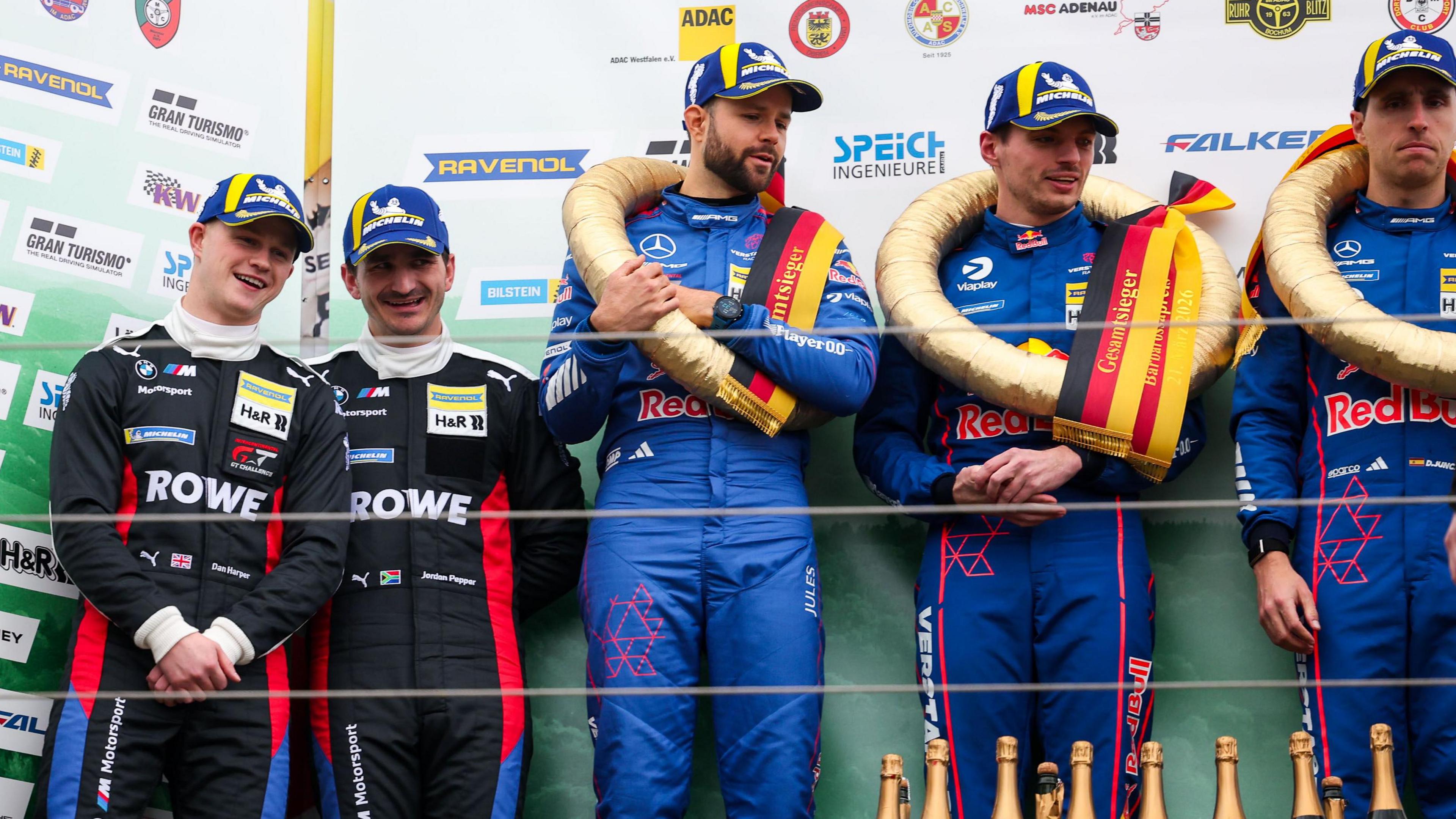 Dan Harper on the podium with Max Verstappen at the Nurburgring