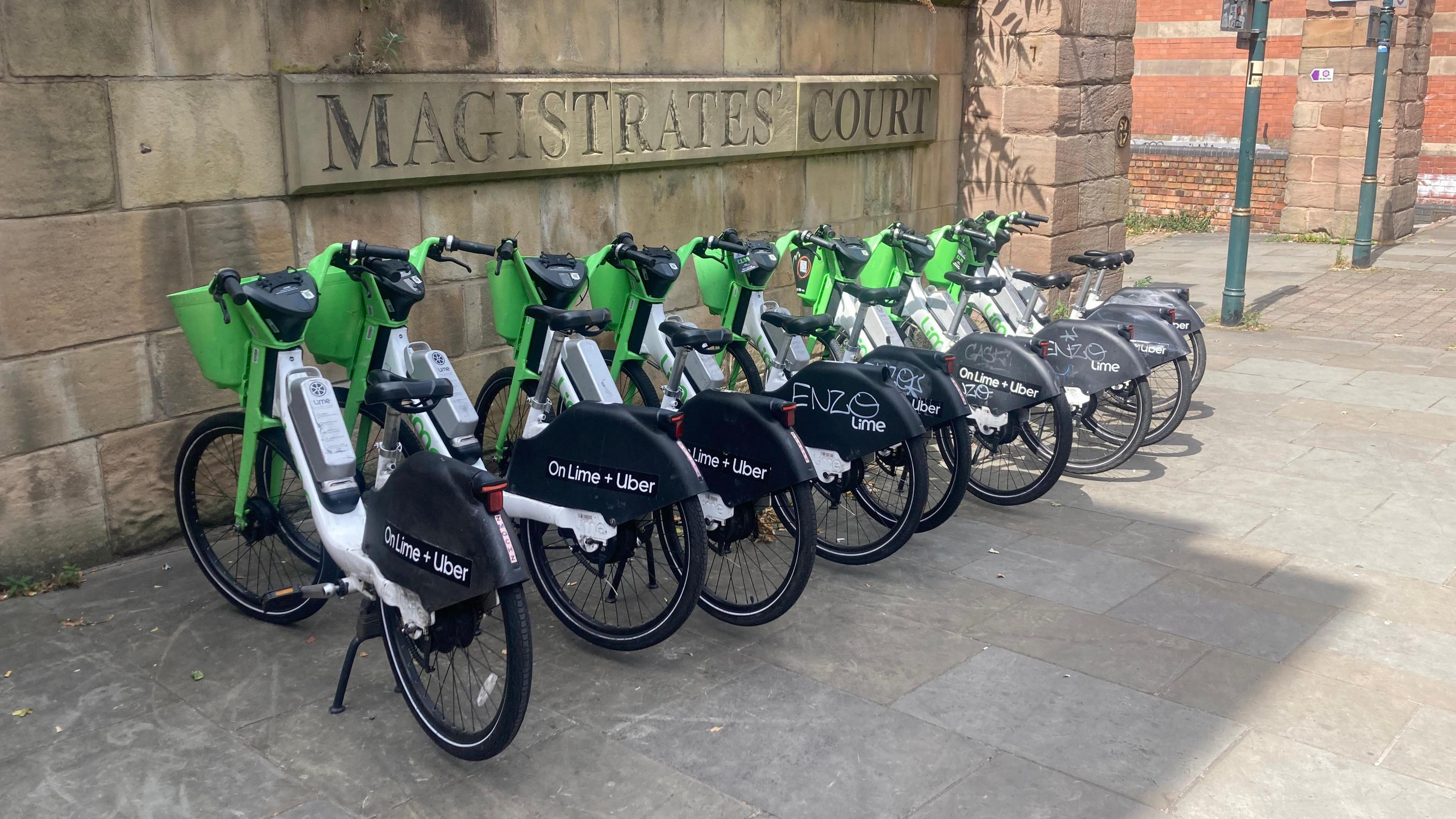 A row of parked e-bikes in Nottingham