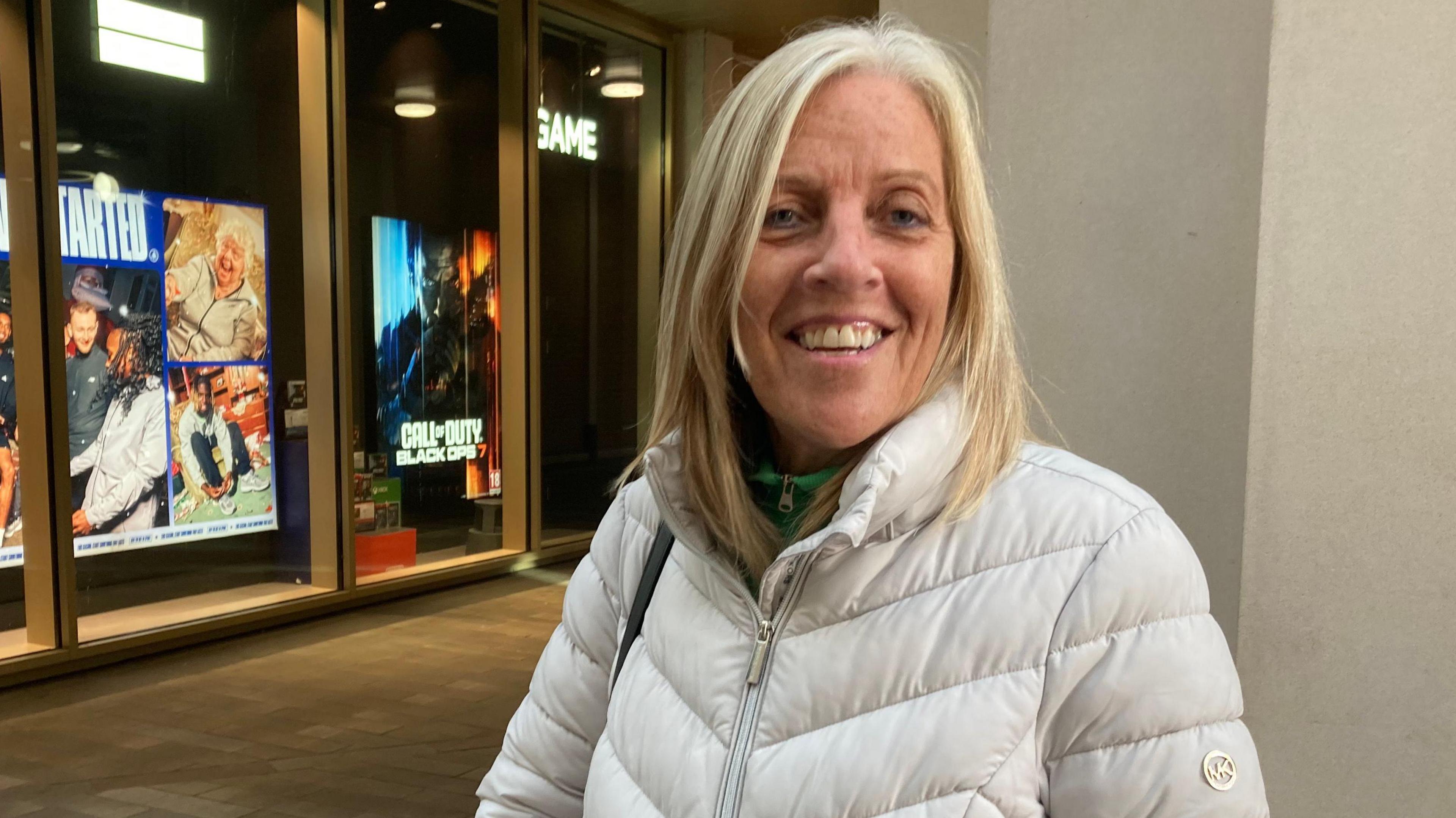 Dianne Sykes, a woman in her late 60s, stood in The Glass Works.