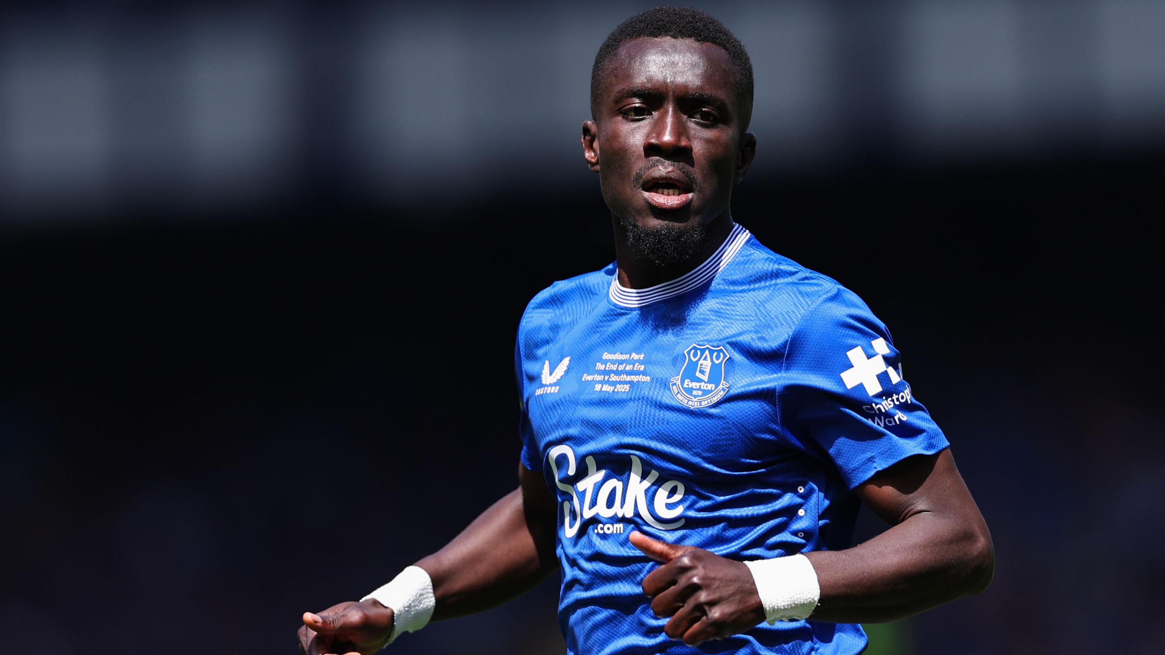Idrissa Gana Gueye in action for Everton in blue home shirt