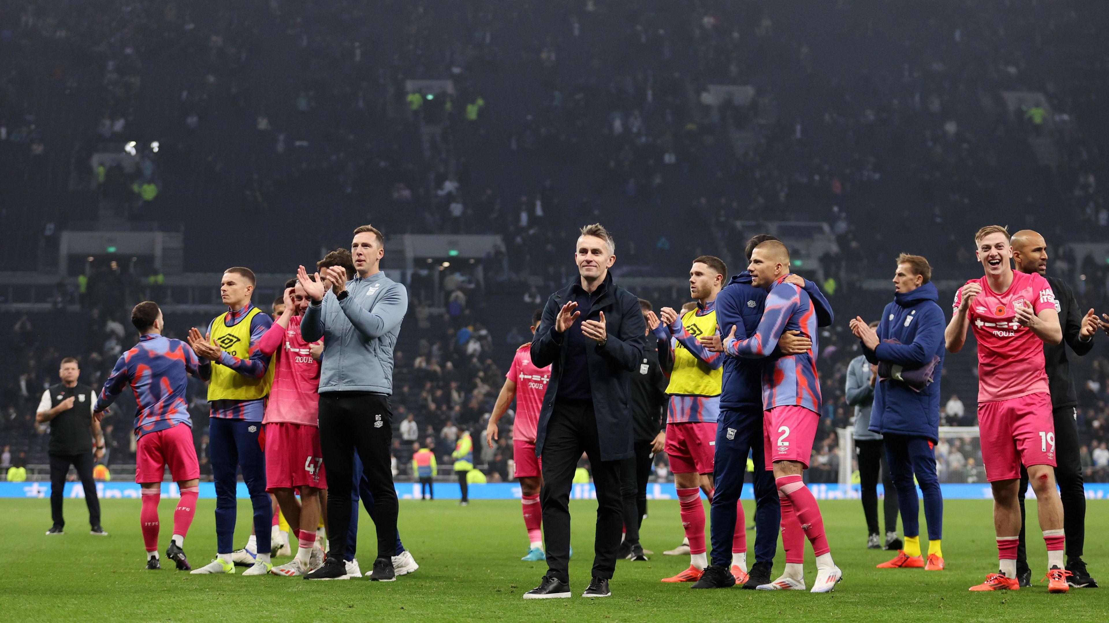 Kieran McKenna and his Ipswich players salute their fans at Tottenham Hotspur Stadium