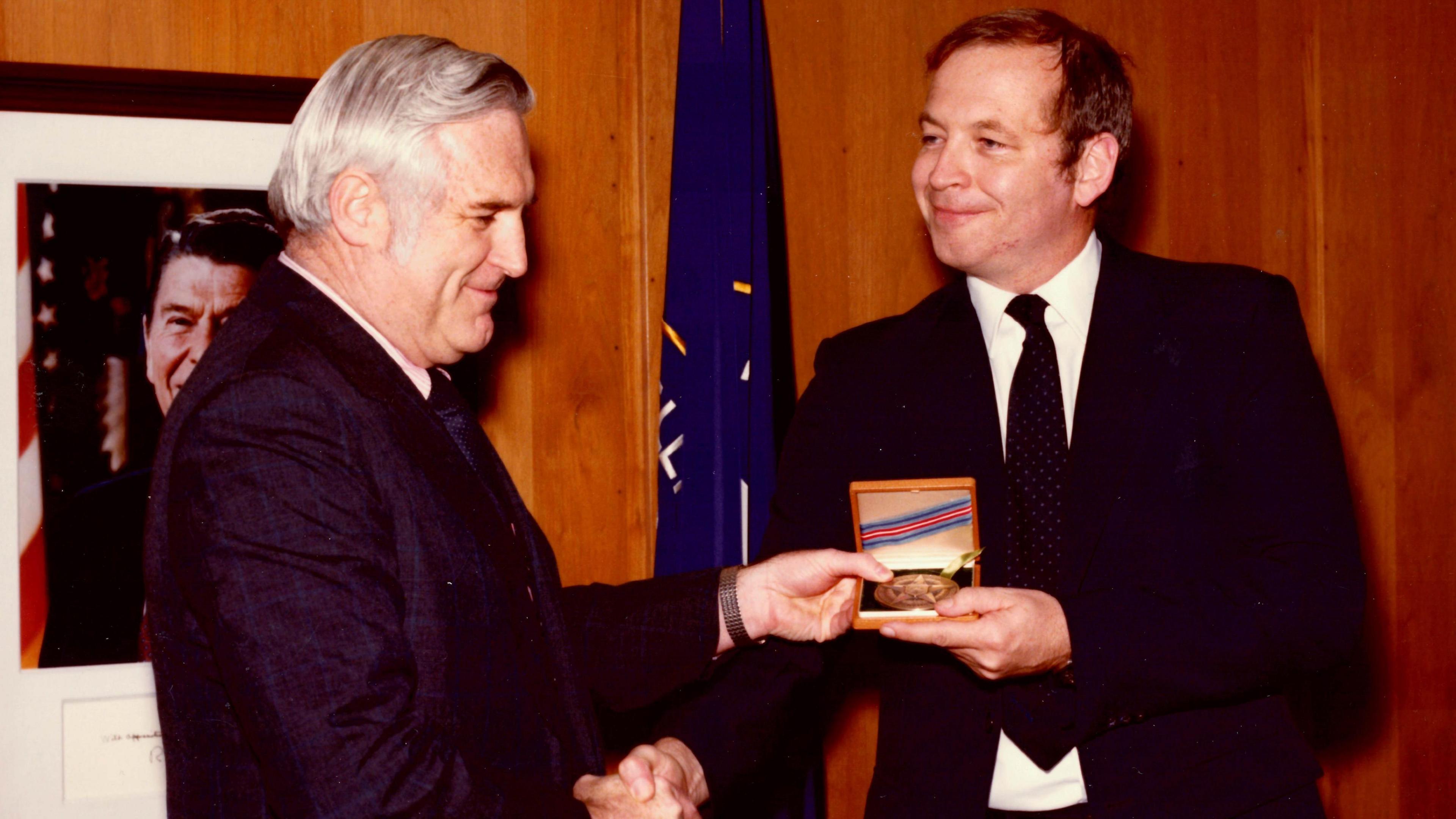 Edward Johnson receiving the intelligence star from John N McMahon, the Agency’s deputy director for operations at the time