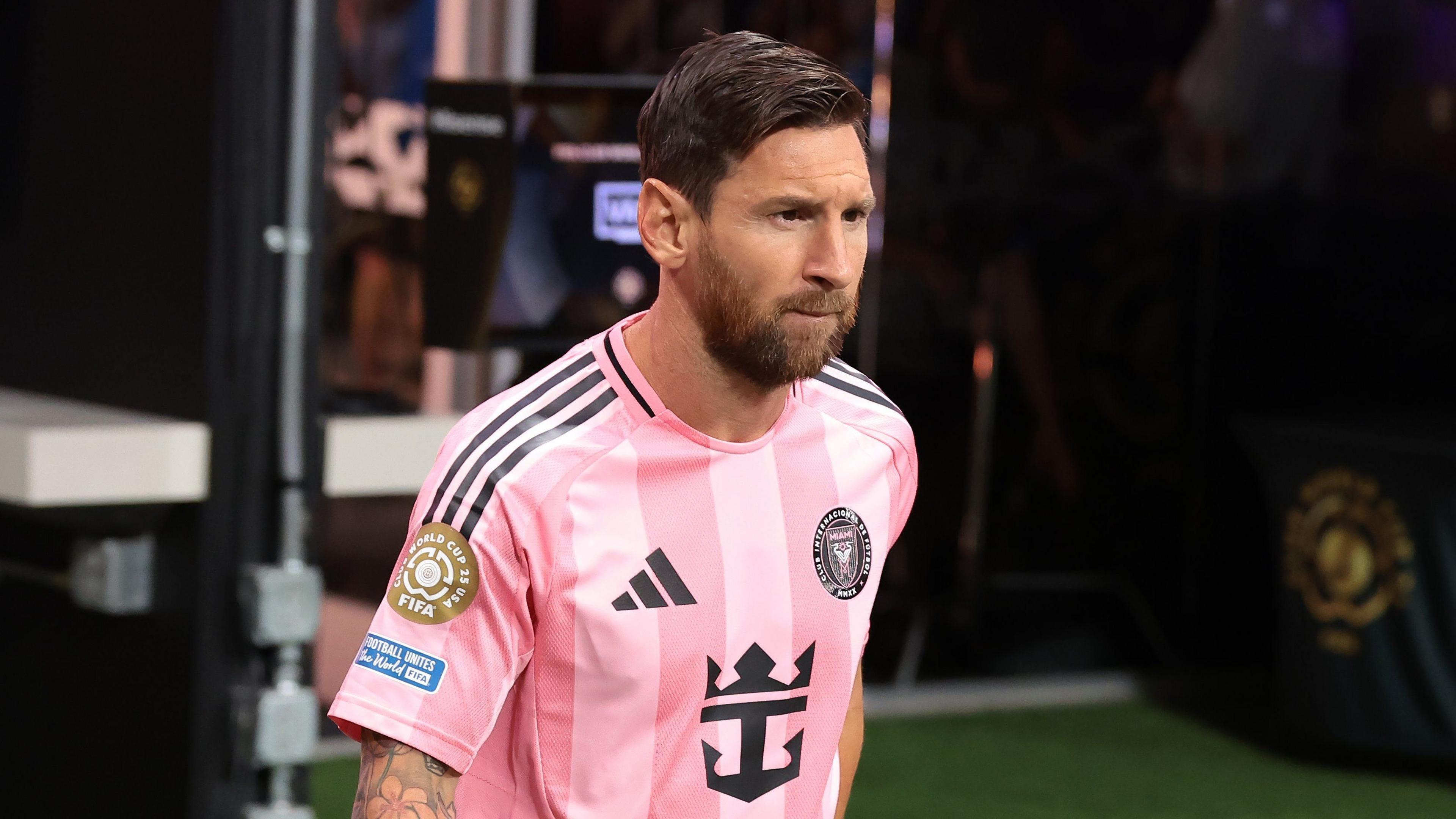 Inter Miami forward Lionel Messi walks out