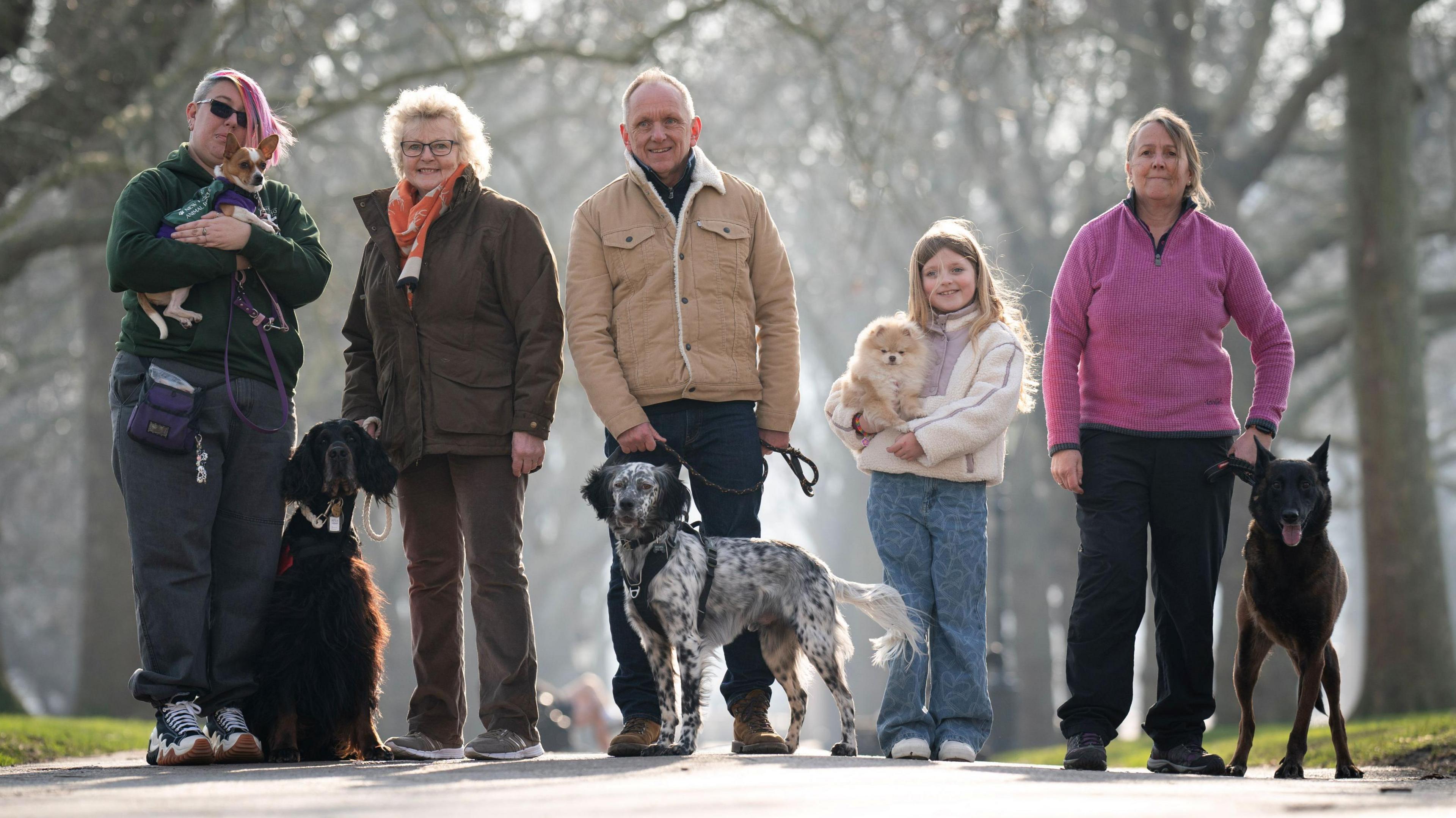 The five finalist dogs and there owners 