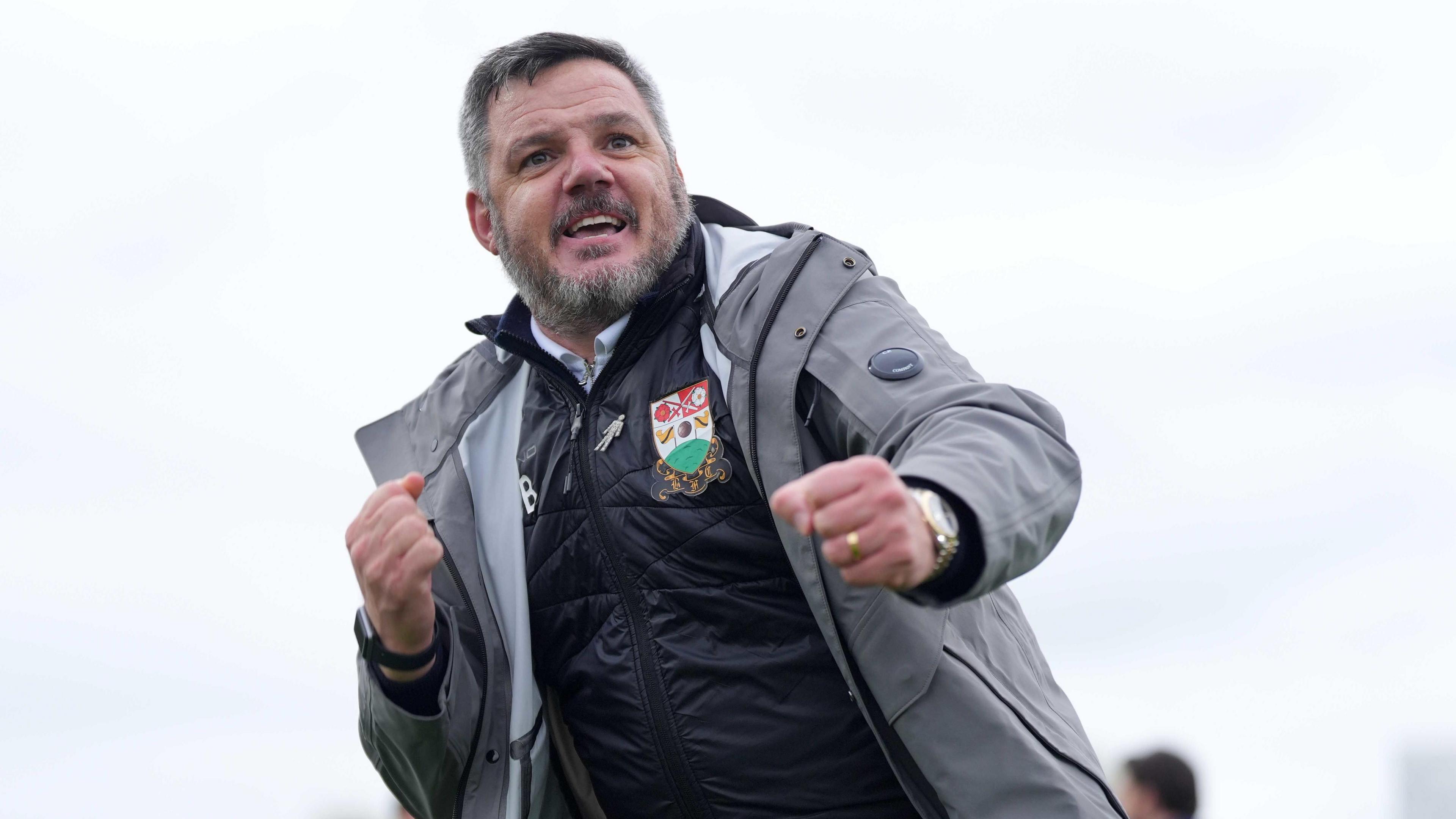 Barnet manager Dean Brennan celebrates