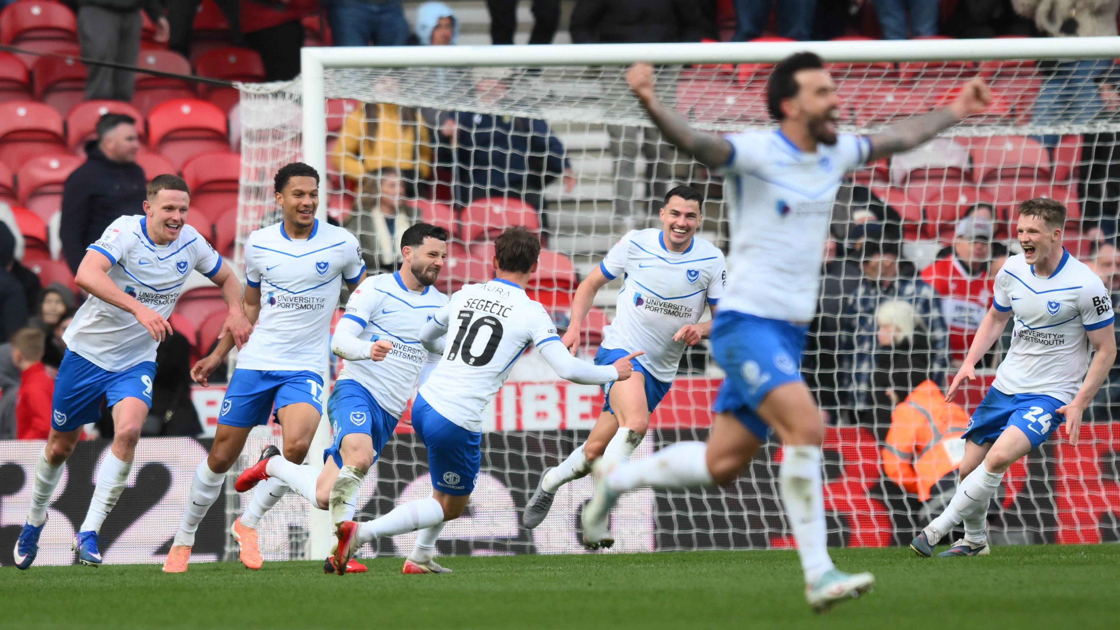 Portsmouth celebrate their late winner at Middlesbrough