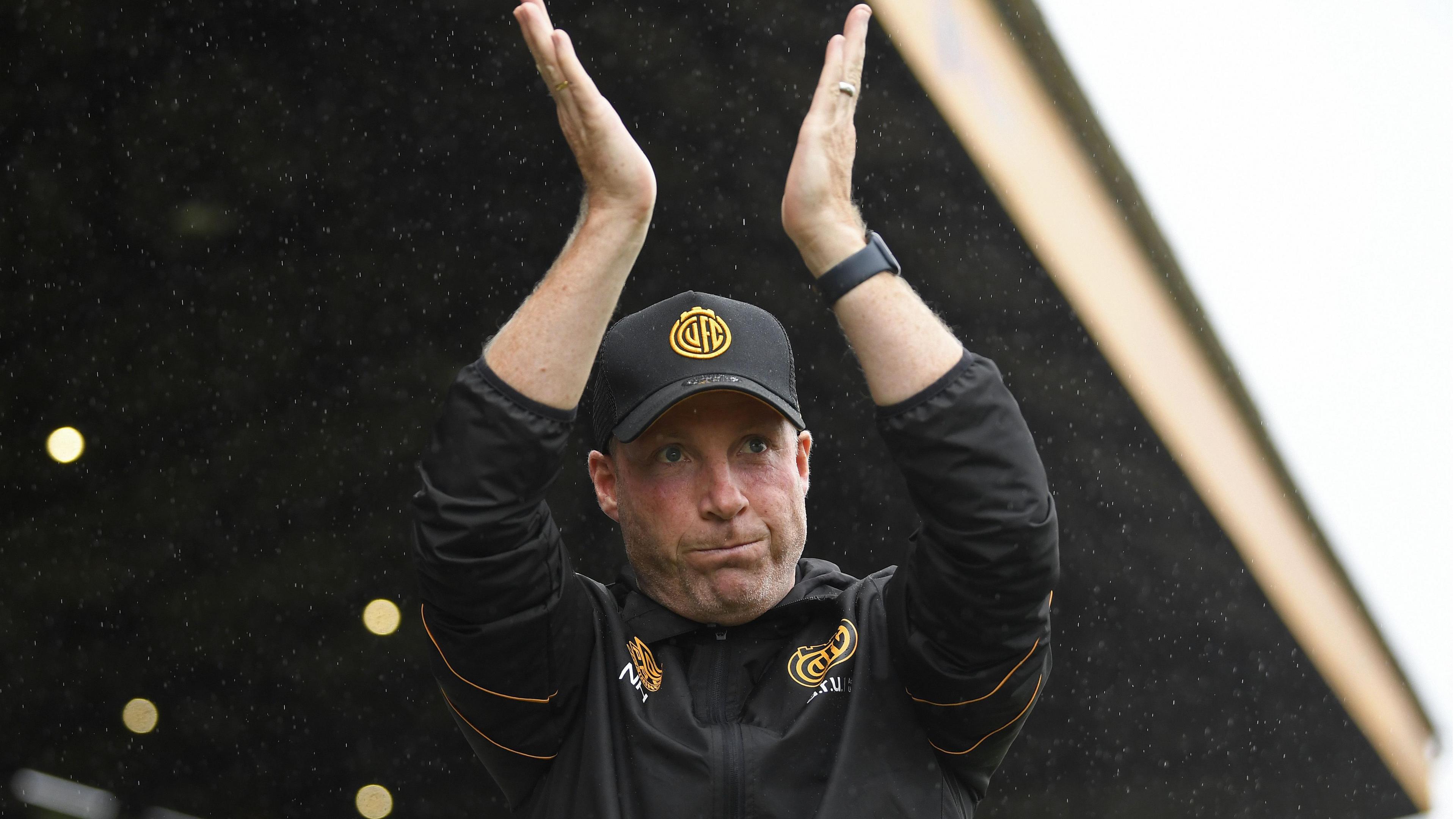 Cambridge boss Neil Harris claps supporters 