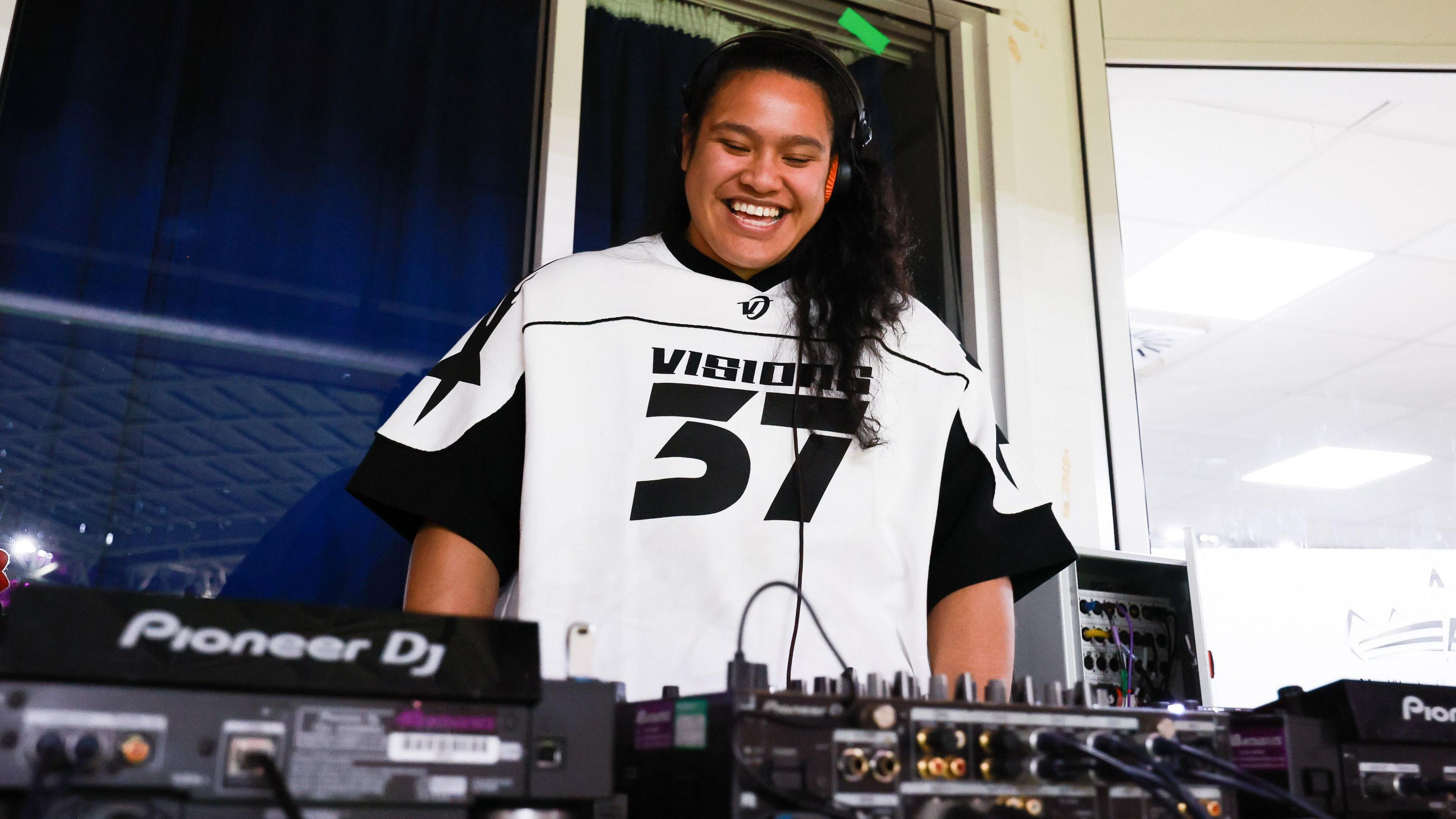 Sisilia Tuipulotu on the decks at Wales v England
