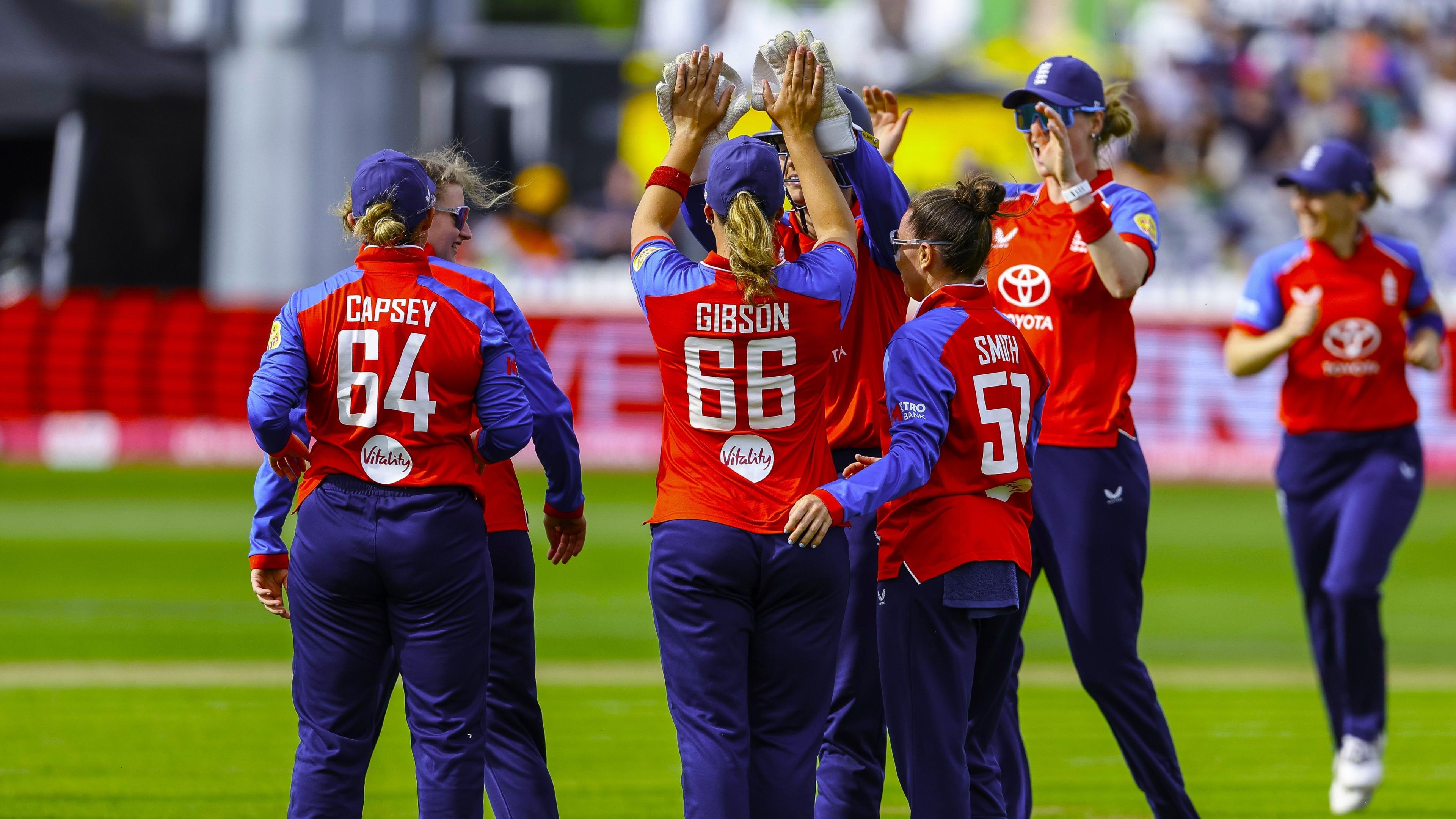 The England women's cricket team celebrate after defeating India in their T20 game in Bristol.