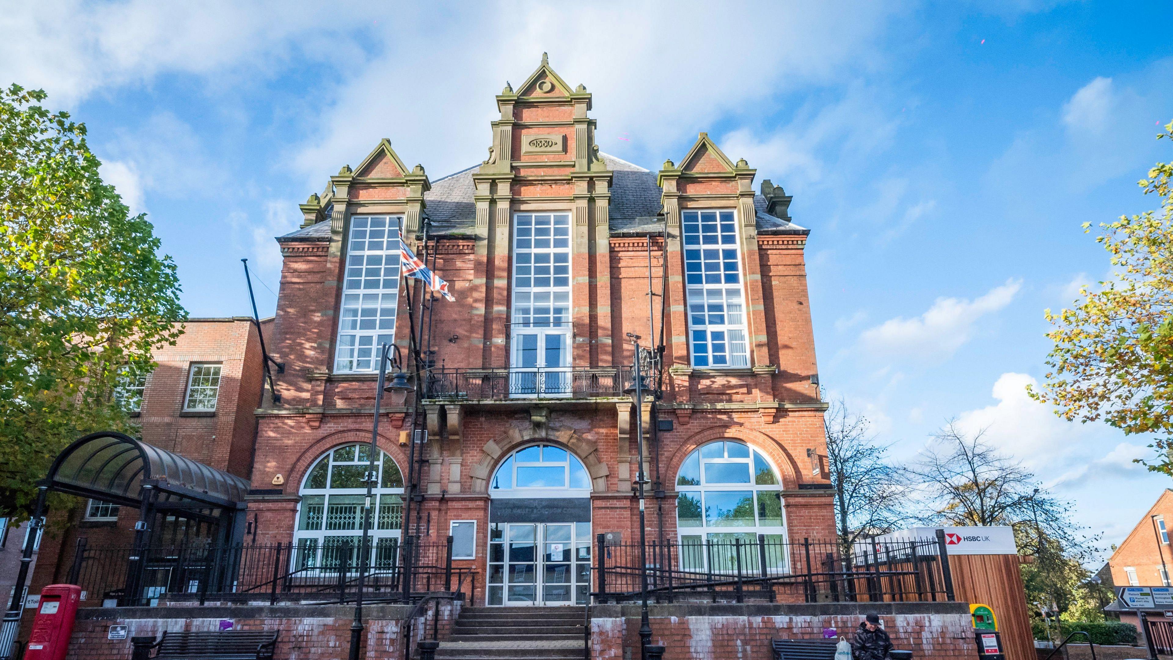 Amber Valley Borough Council's office. It is a grand red brick building.