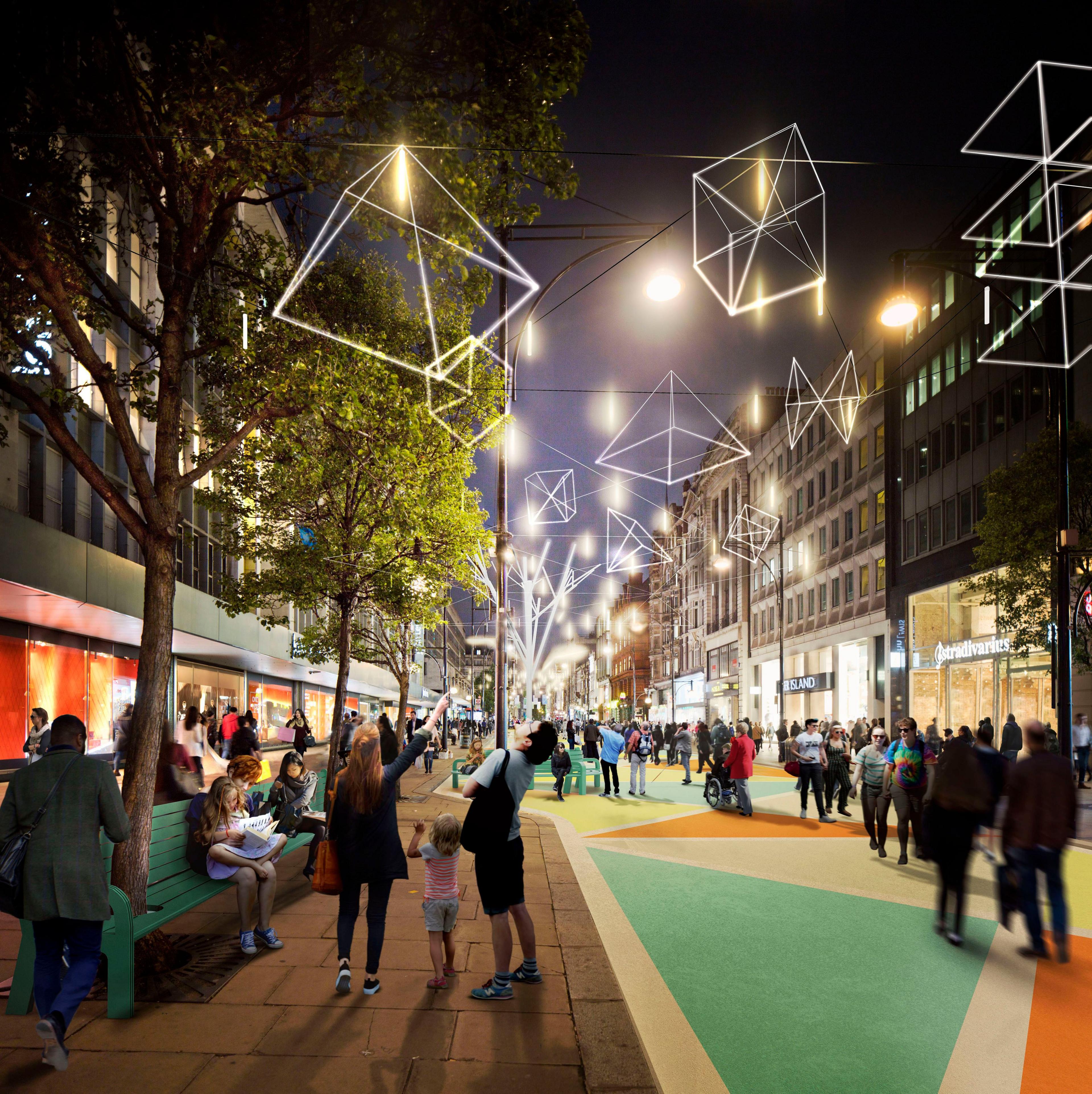 A group stand looking above them at lights in the shape of a triangle 