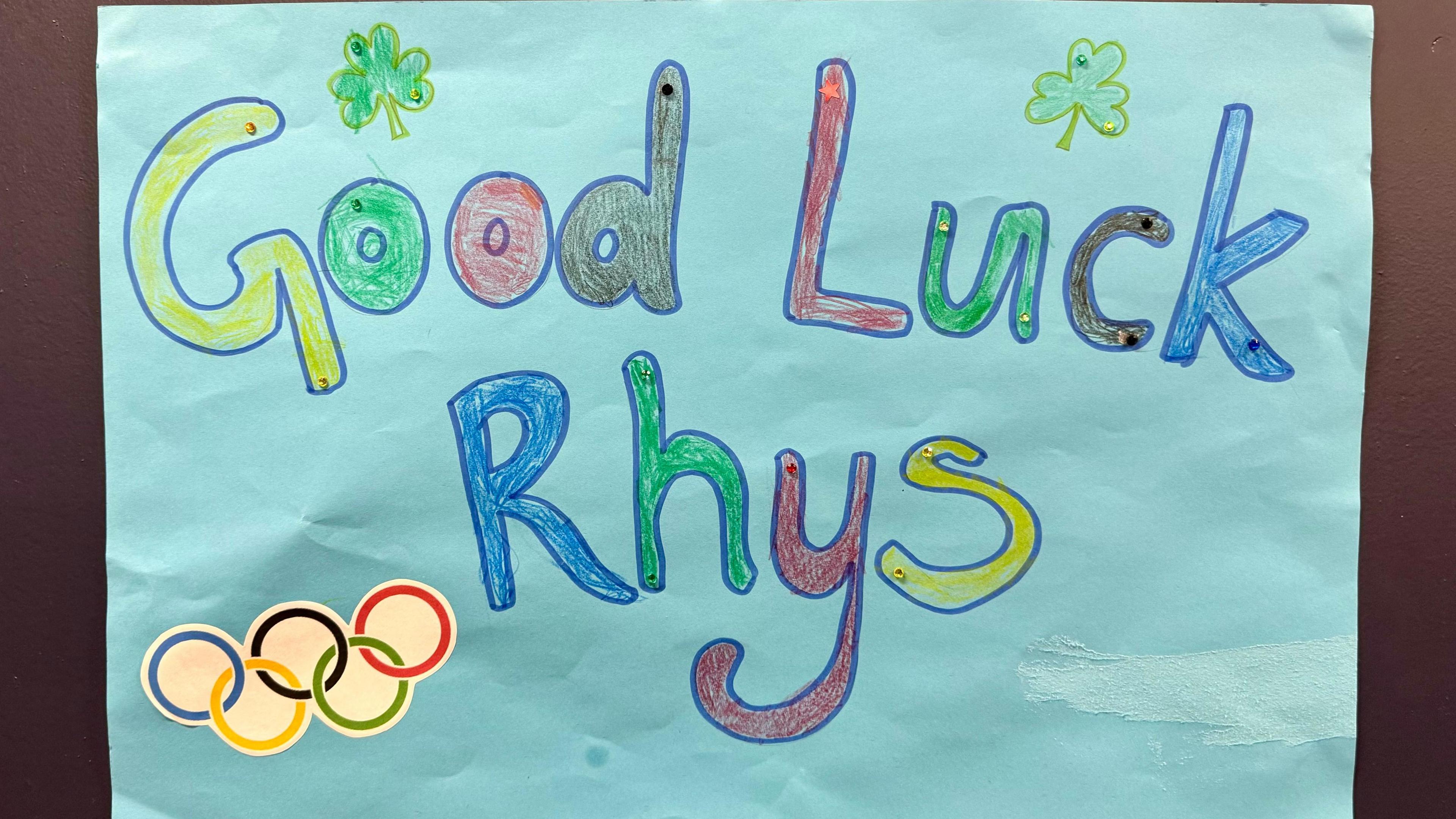 Colour handmade poster that reads "good luck Rhys"