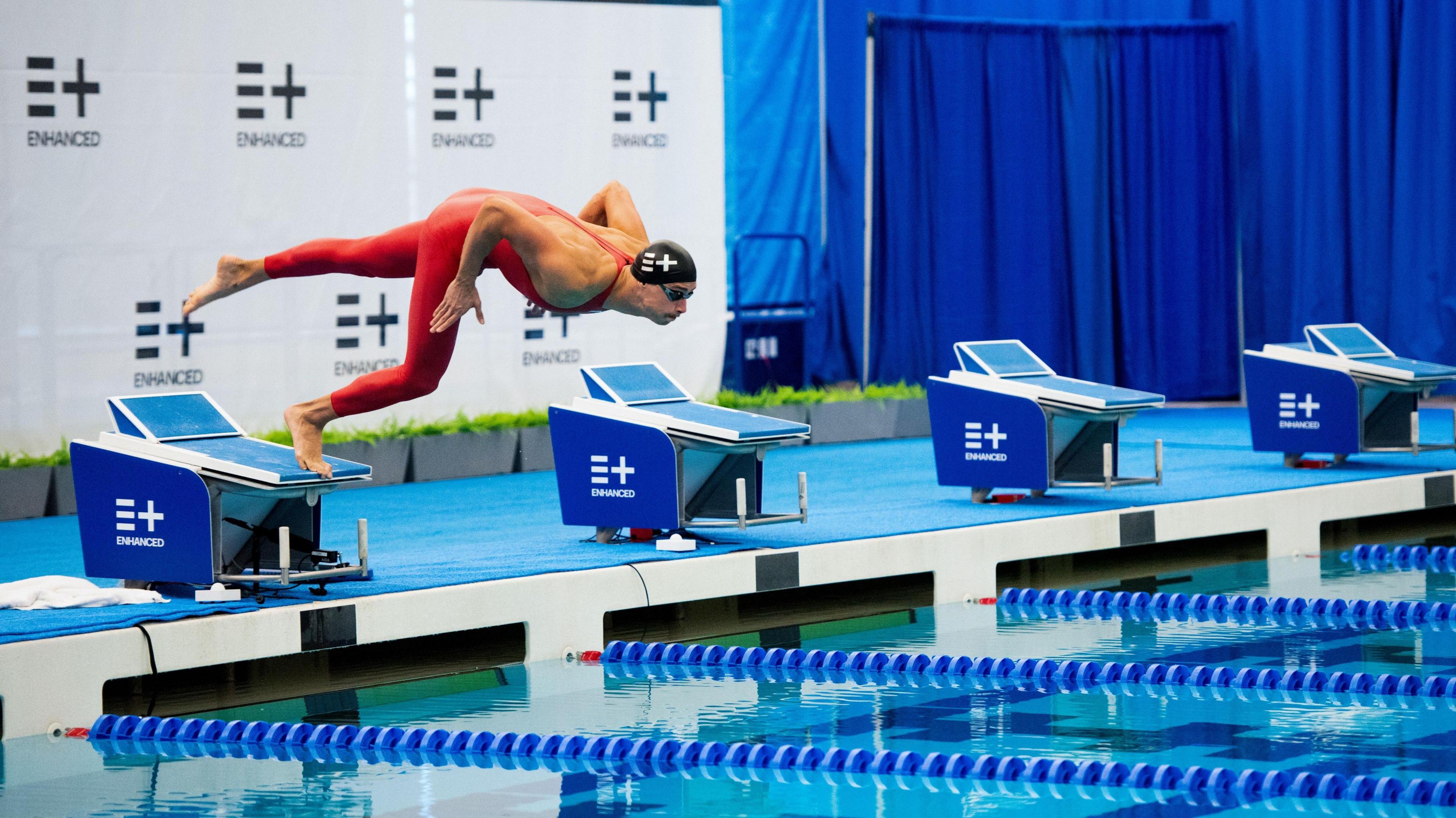 Kristian Gkolomeev dives into the pool