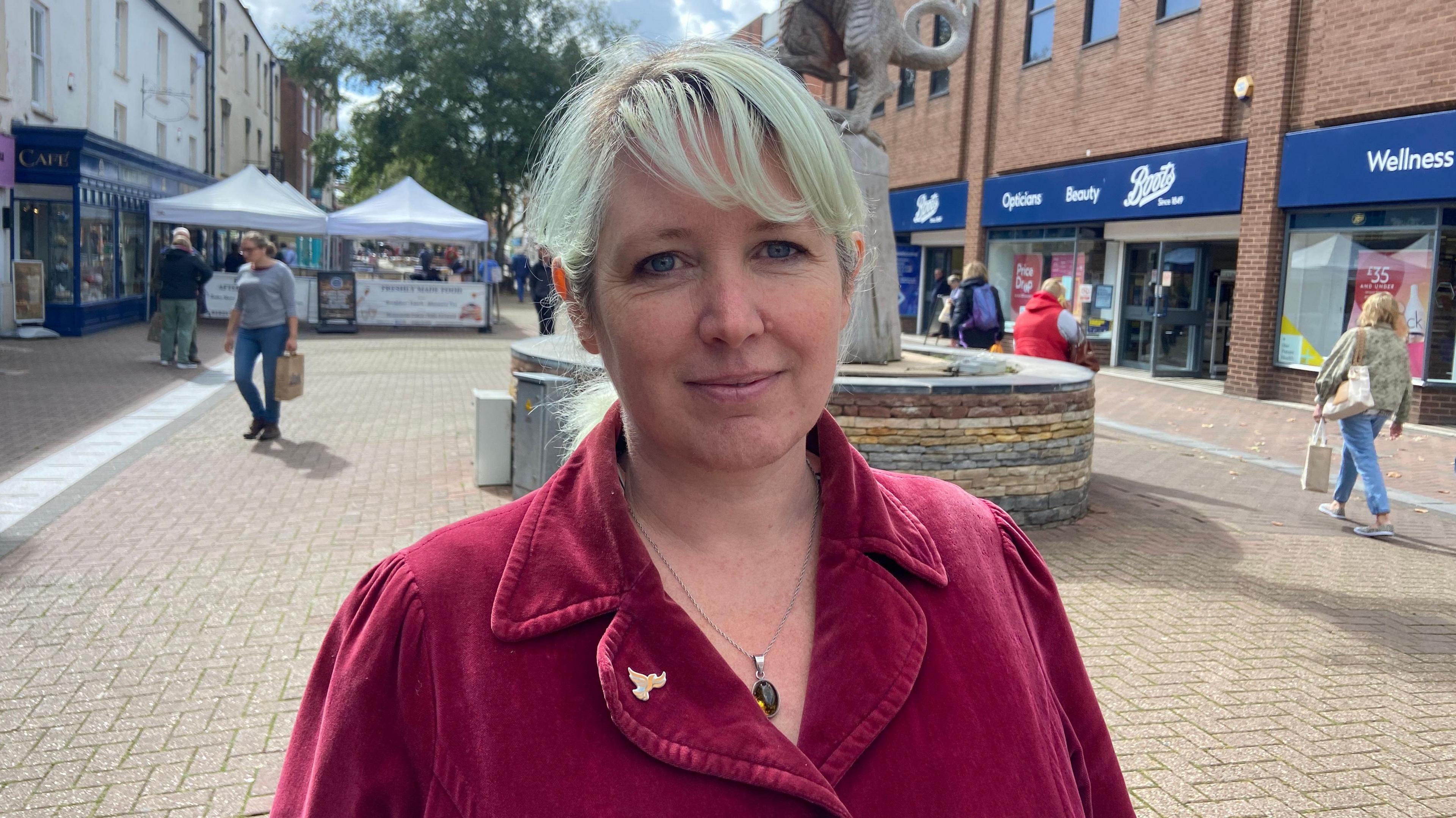 Councillor Amber Packer-Hughes, Deputy Leader of Taunton Town Council, standing in a pedestrianised street in Taunton.