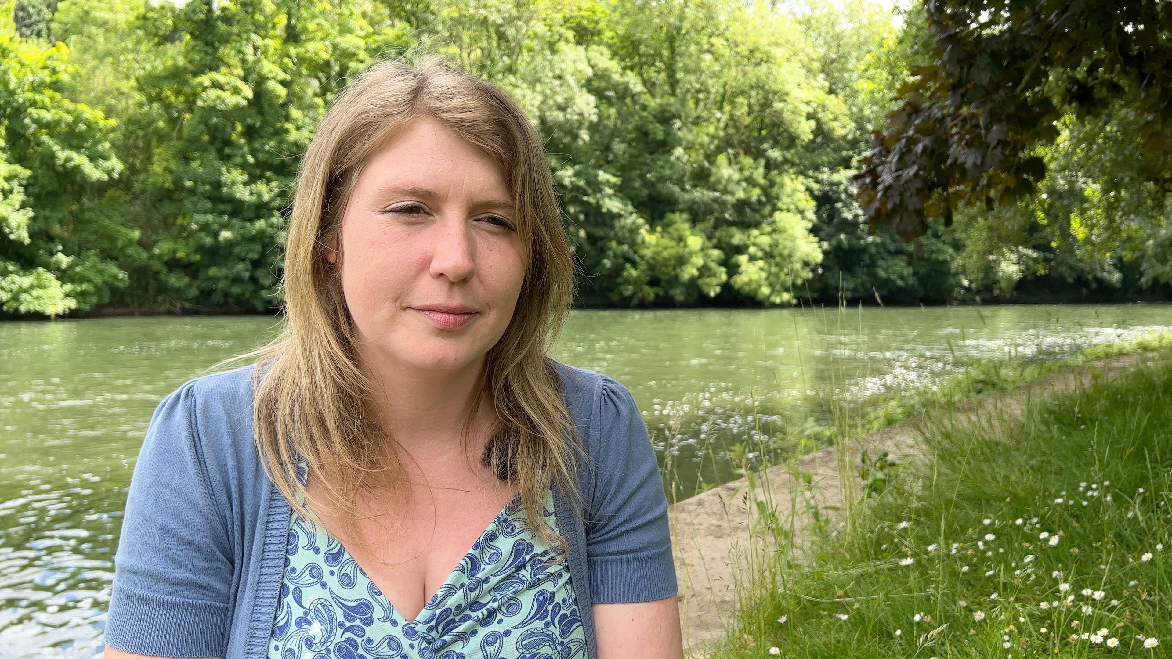 Dr Sam Mudie by the banks of the River Thames