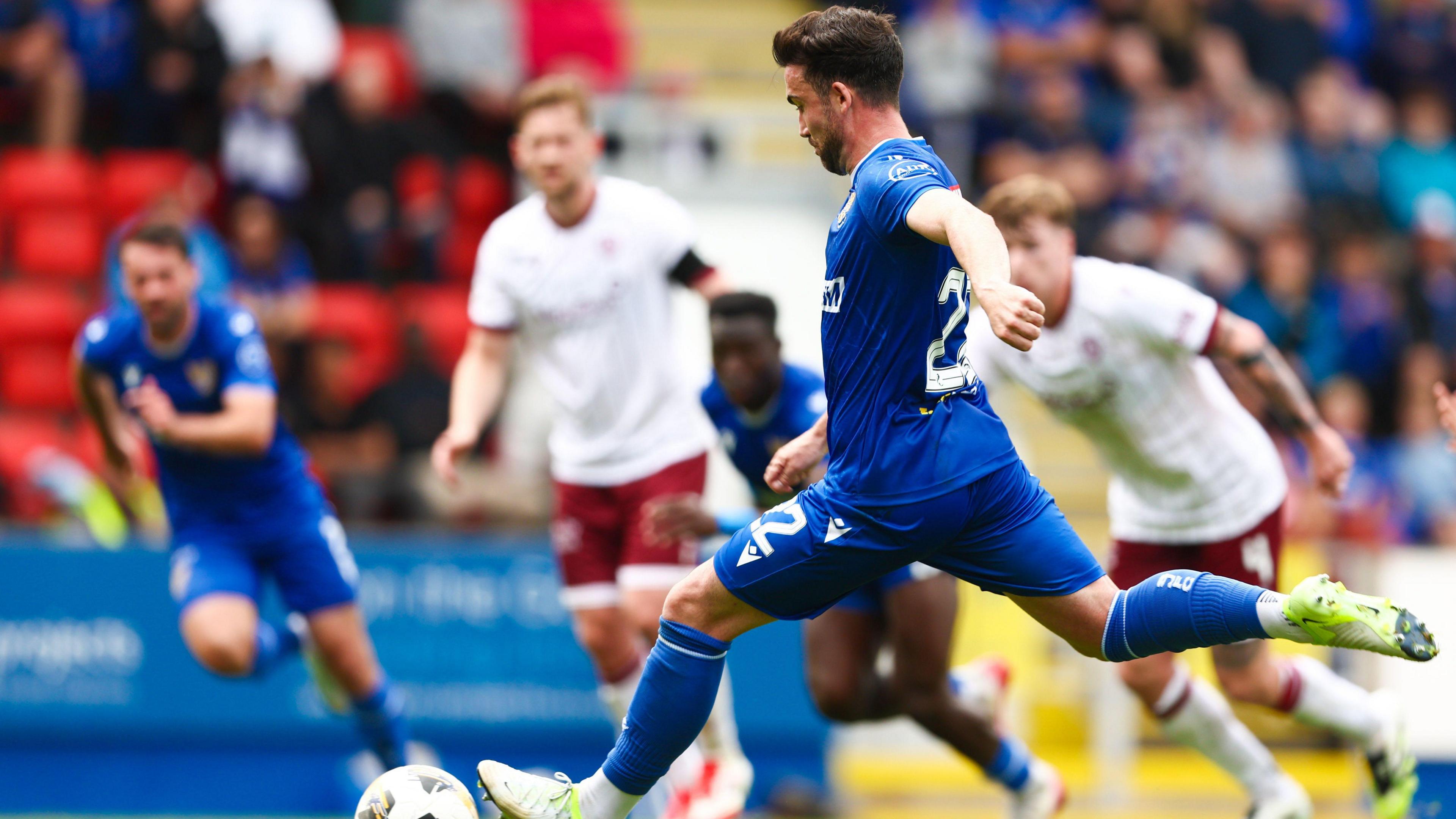 Stevie Mallan scores a penalty for St Johnstone against Arbroath