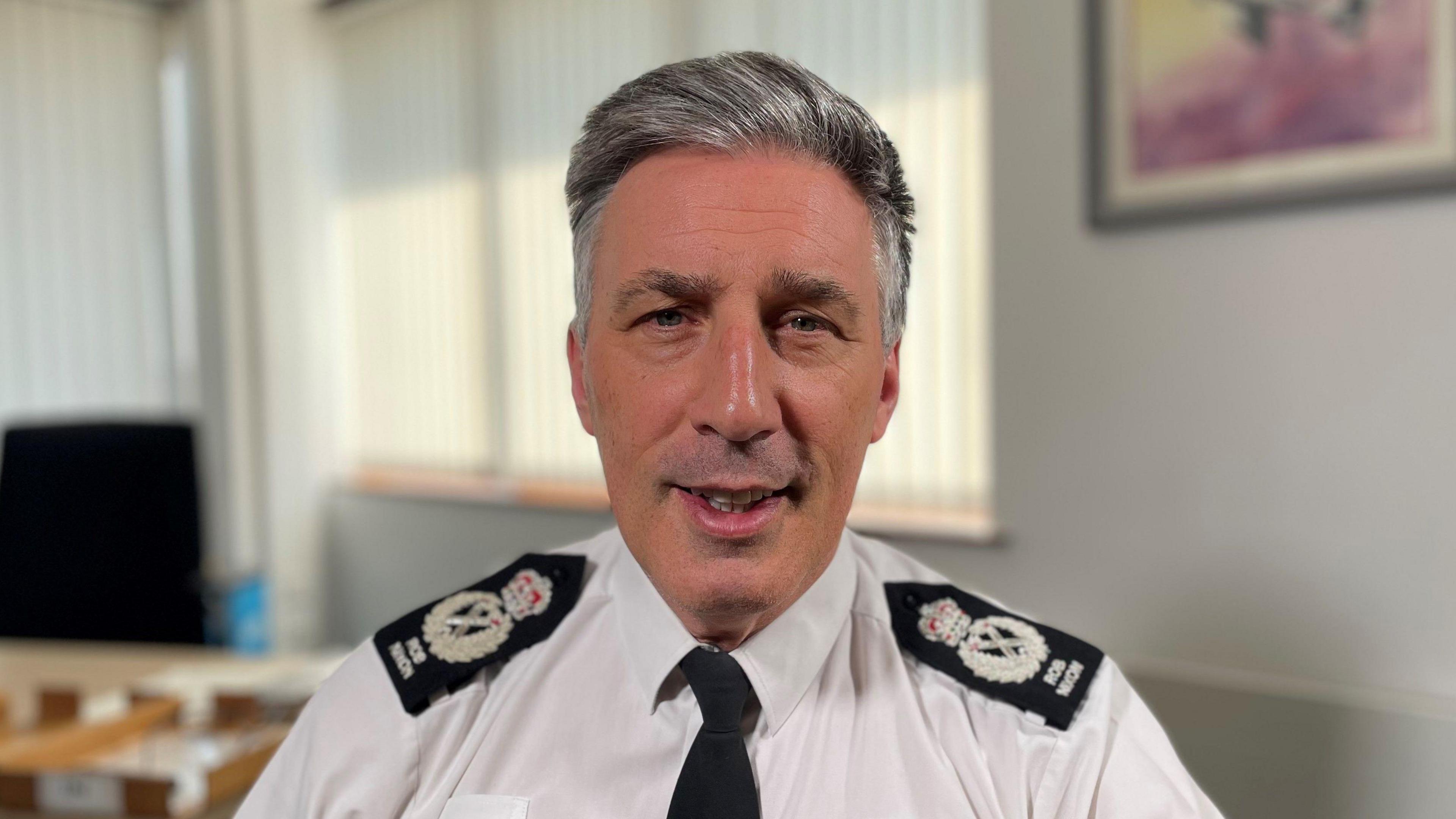 Chief Constable Rob Nixon is in his office at Leicestershire Police headquarters