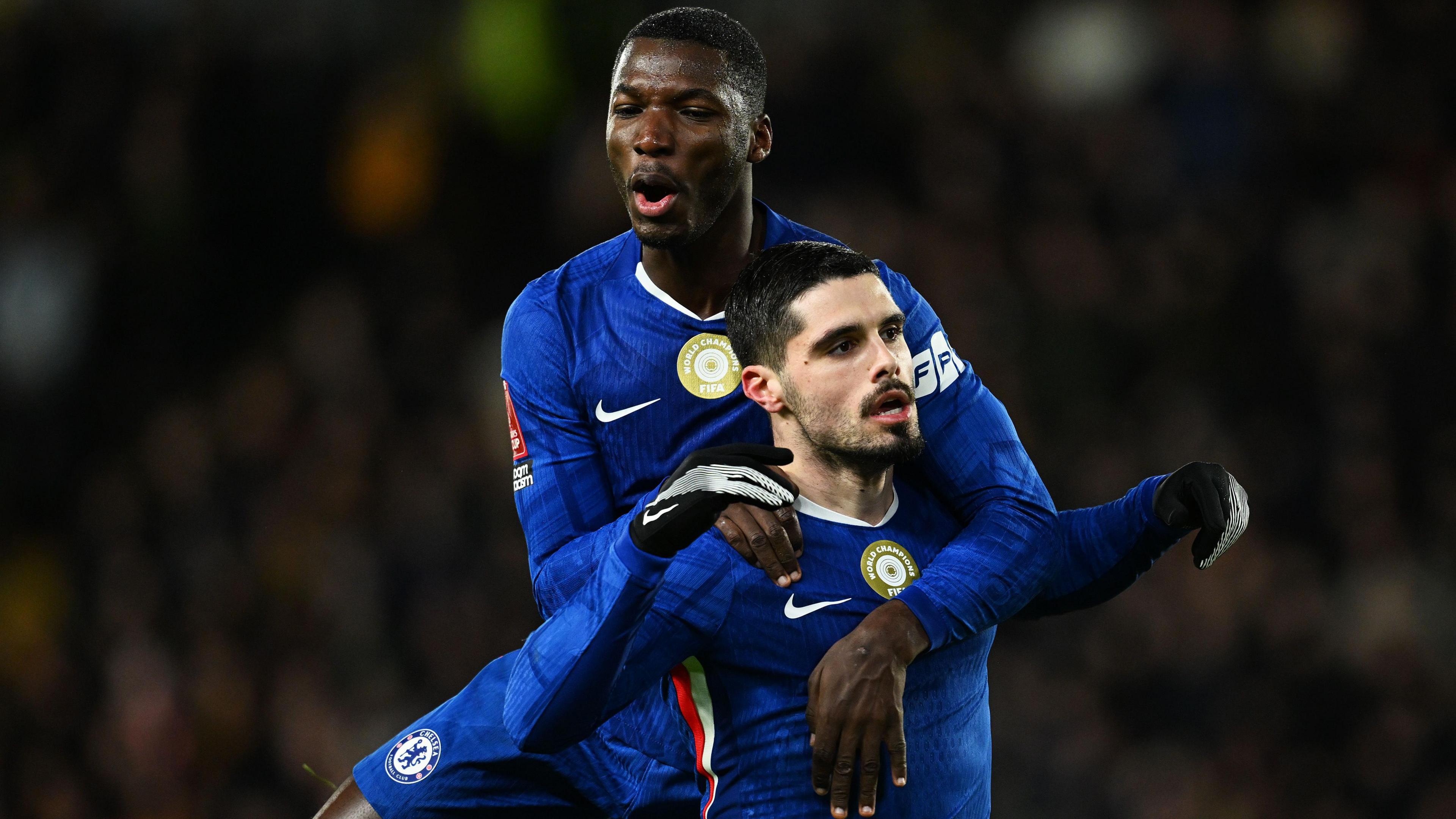 Moises Caicedo celebrating with Pedro Neto for Chelsea