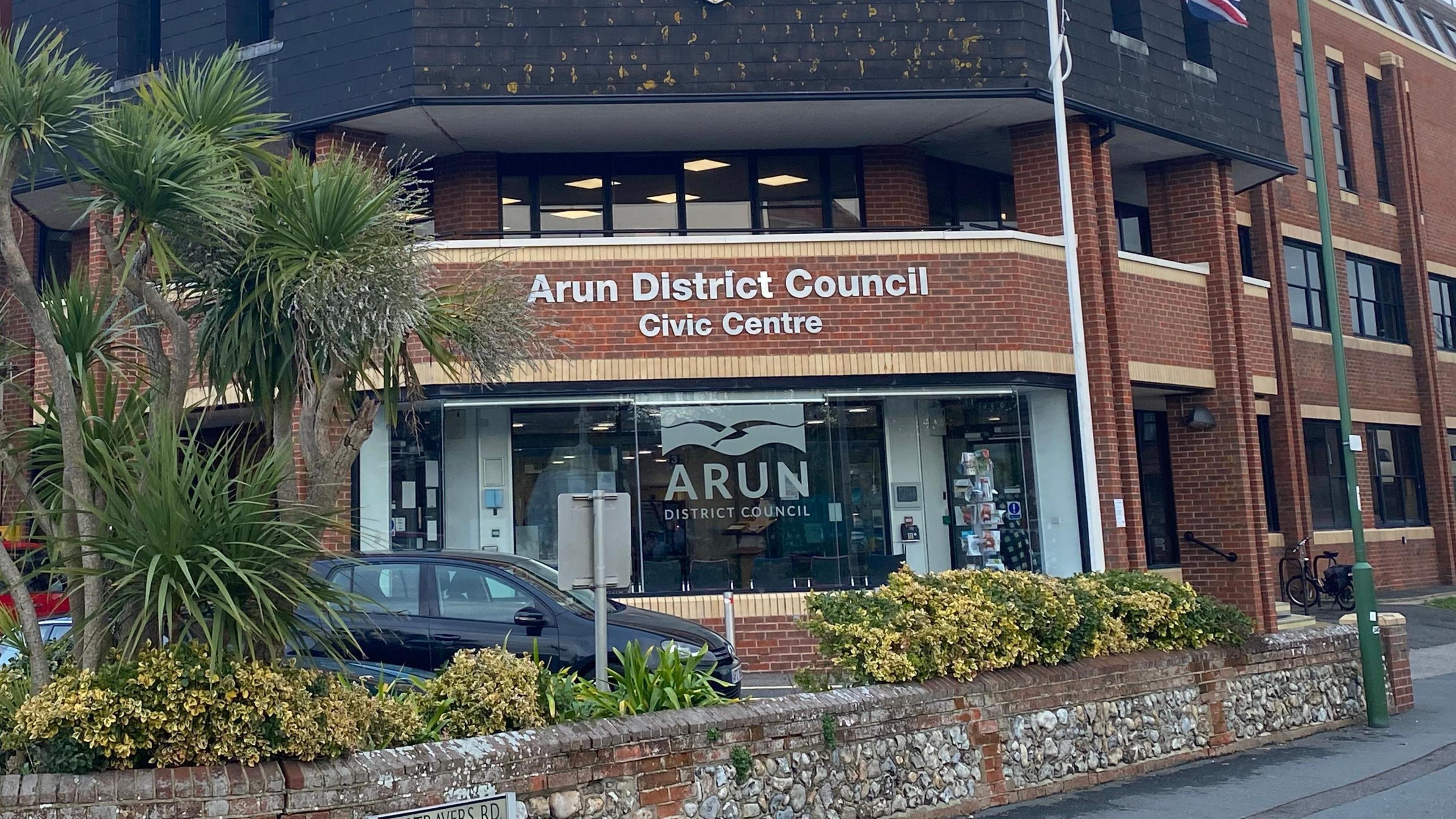 A red brick building. It is a council office.