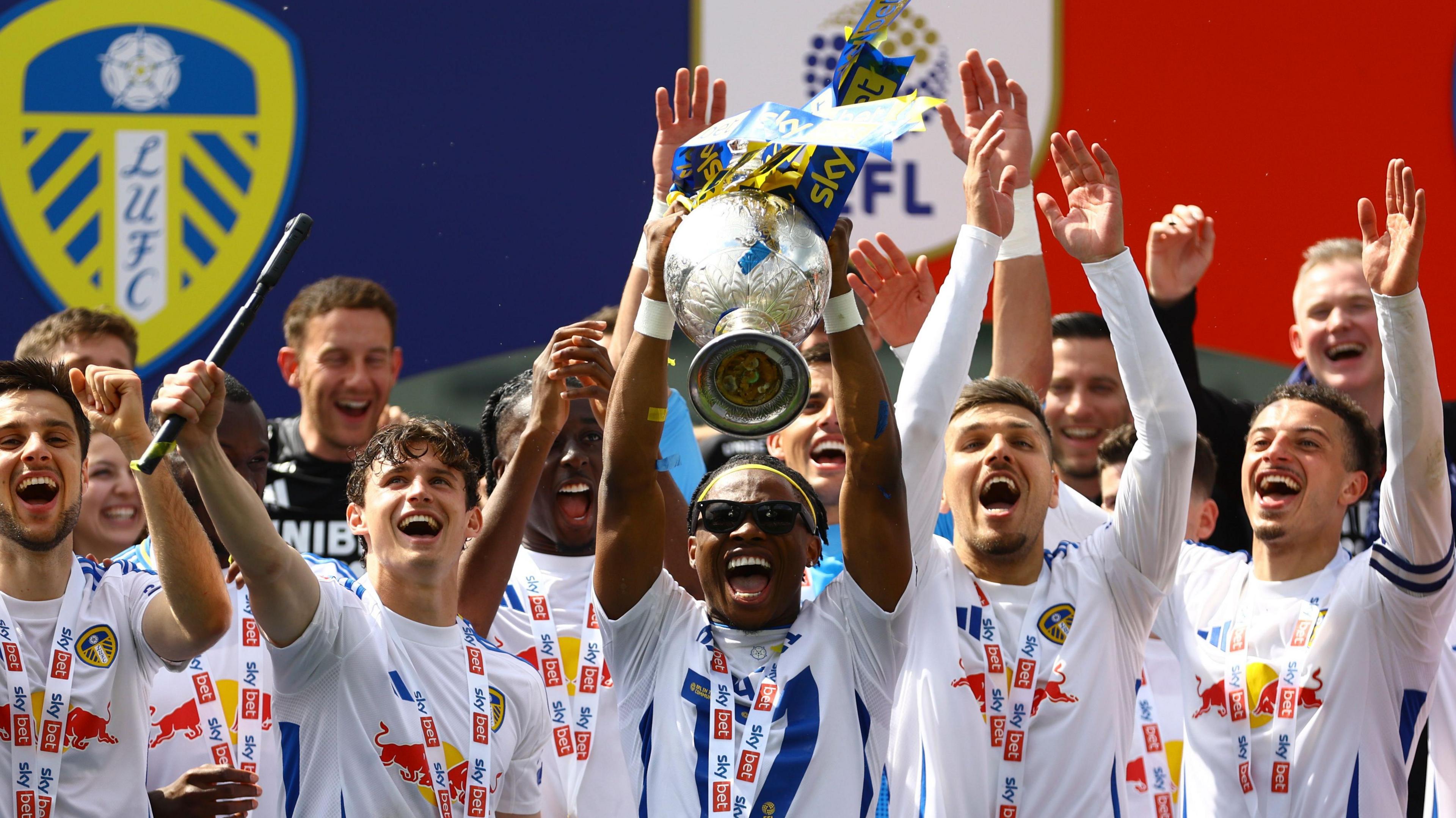 Leeds players lift the Championship title