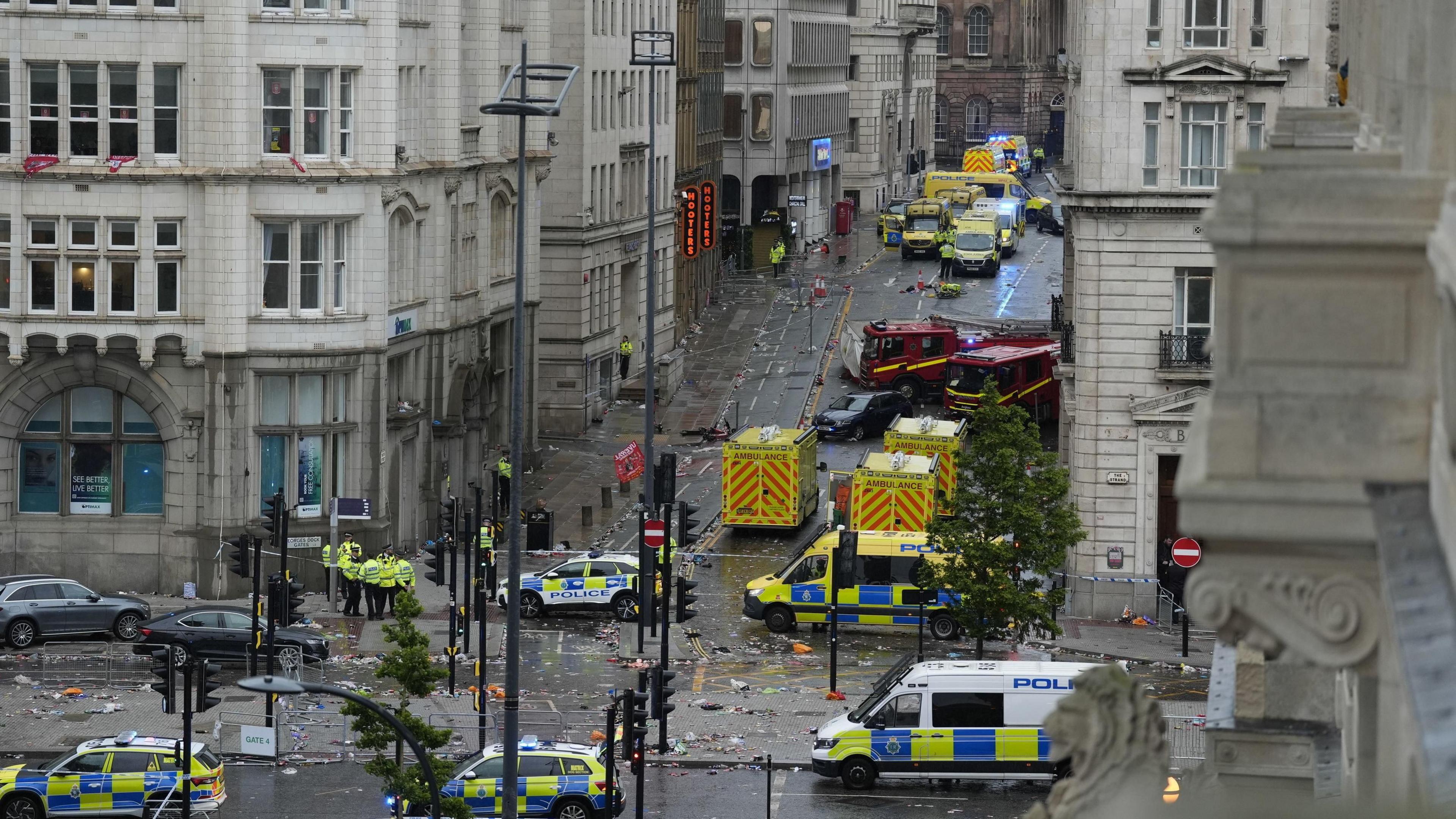 Police and emergency personnel dealing with a road traffic accident on Water Street near the Liver Building in Liverpool after a car collided with pedestrians 