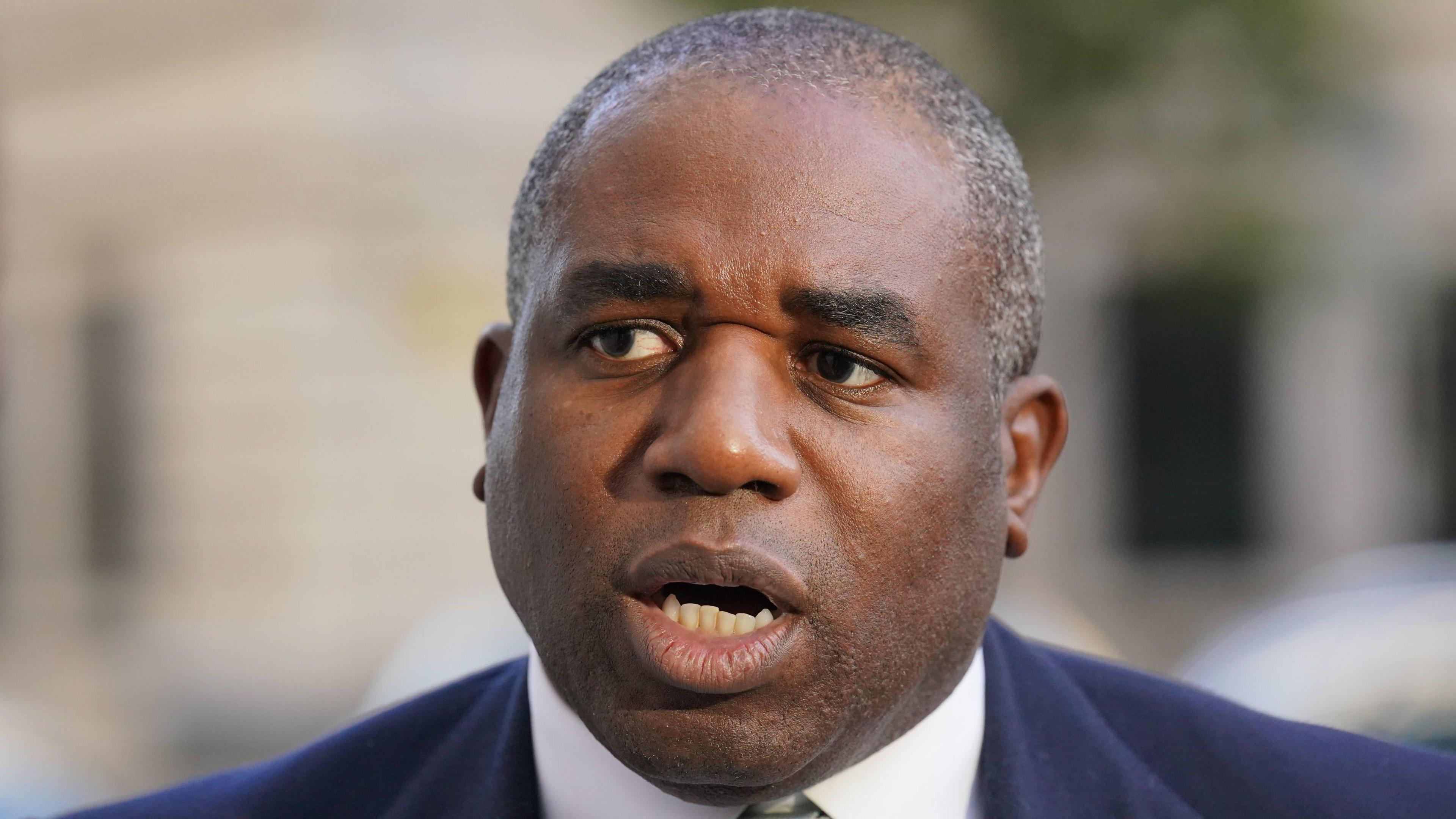 Shadow foreign secretary David Lammy speaks to the media 