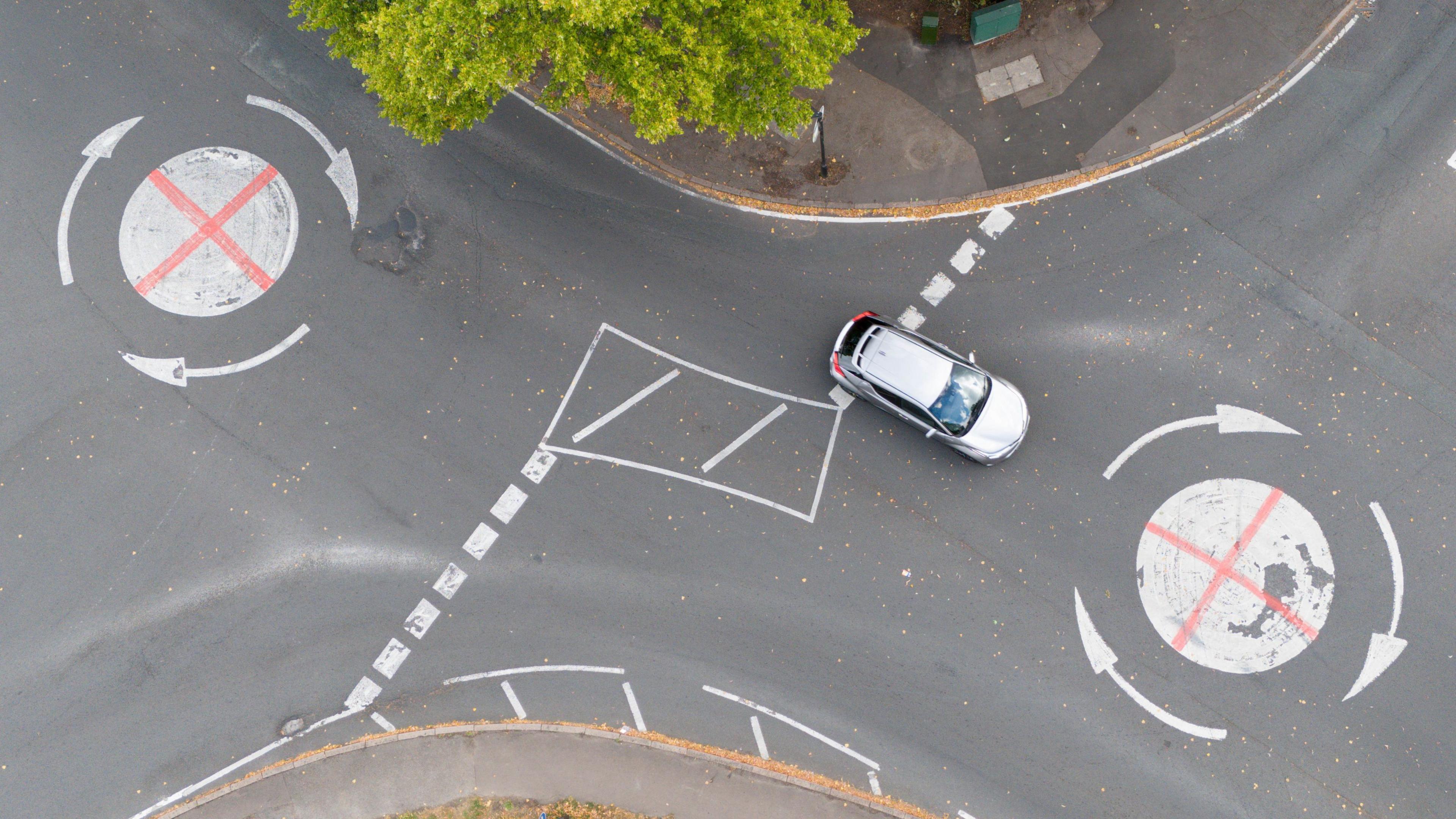 Roundabouts painted as St George's flags in Yardley Wood in south Birmingham Picture date Wednesday August 27, 2025