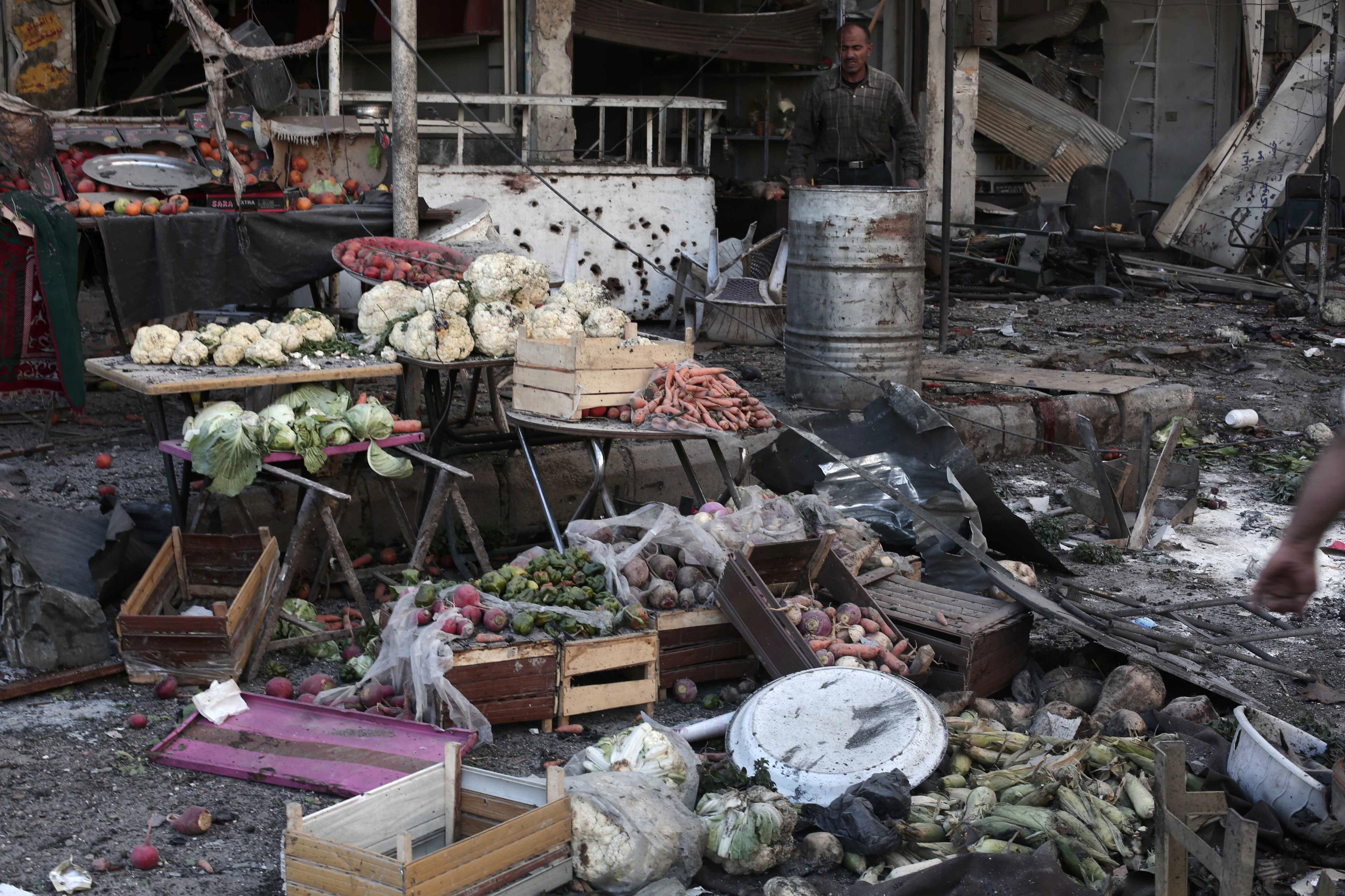 A fruit and vegetable stall in Eastern Ghouta following an air strike