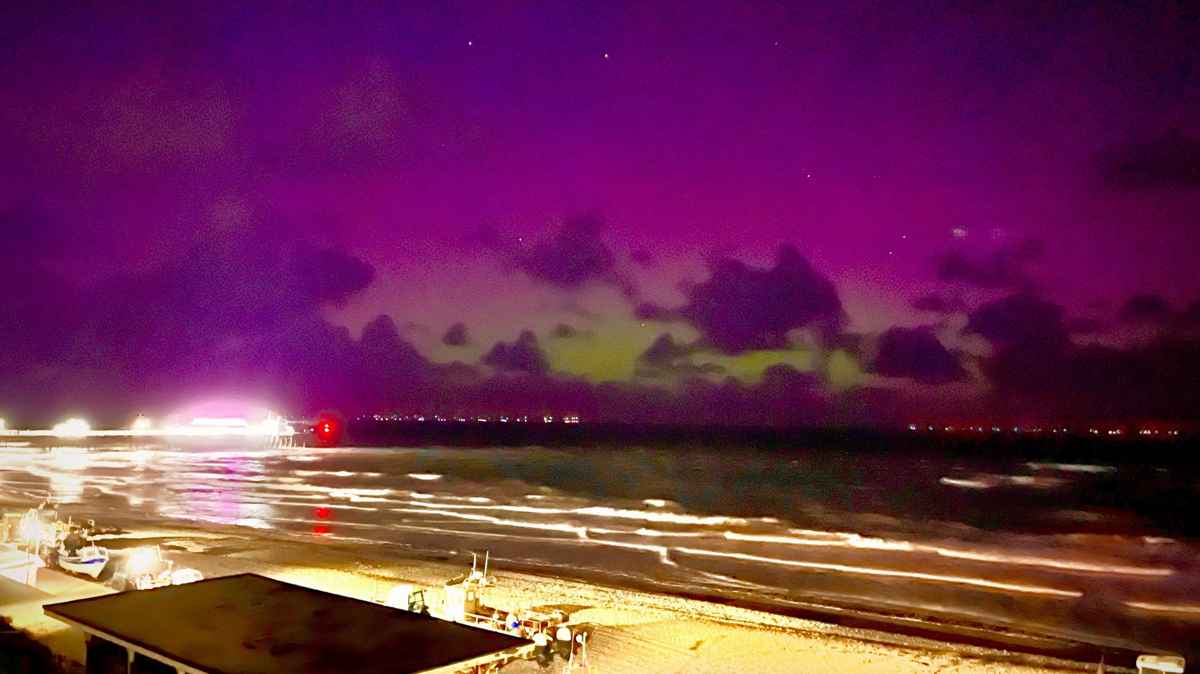 The Aurora Borealis over the beach at Cromer this evening