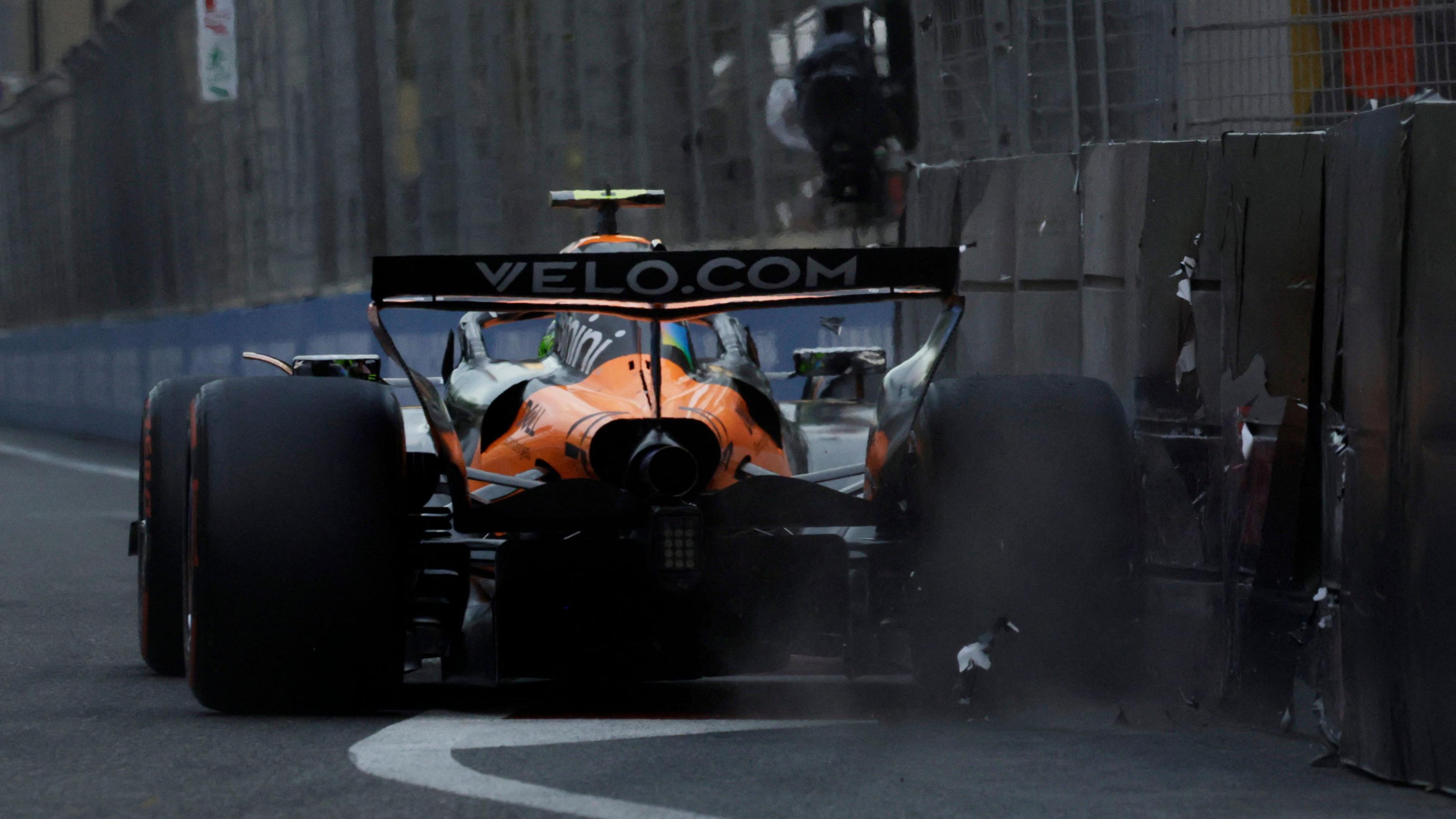 A rear view of McLaren's Lando Norris hitting the wall during Azerbaijan Grand Prix qualifying