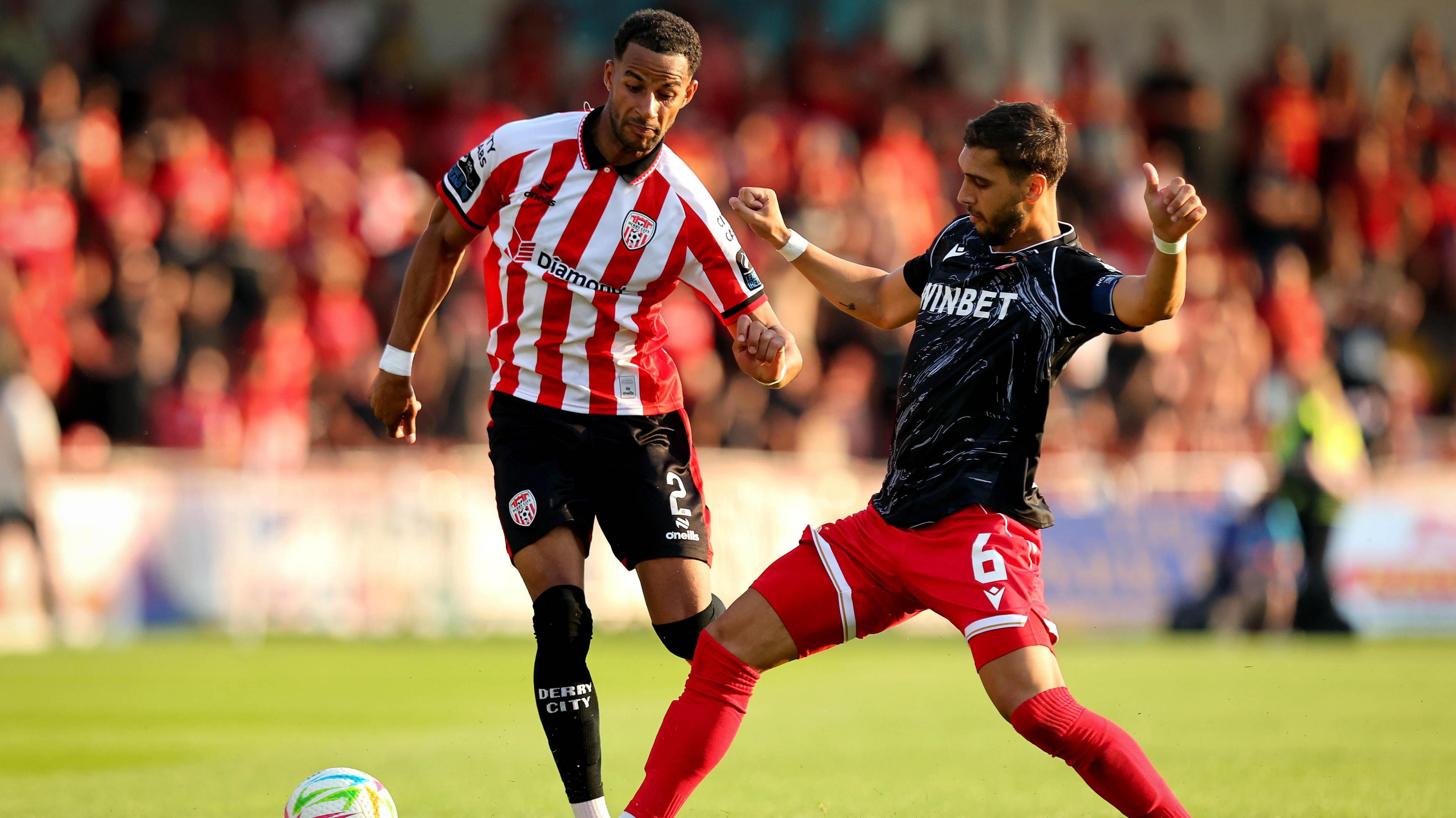 Derry City’s Barry Cotter with CSKA Sofia's Bruno Jordão