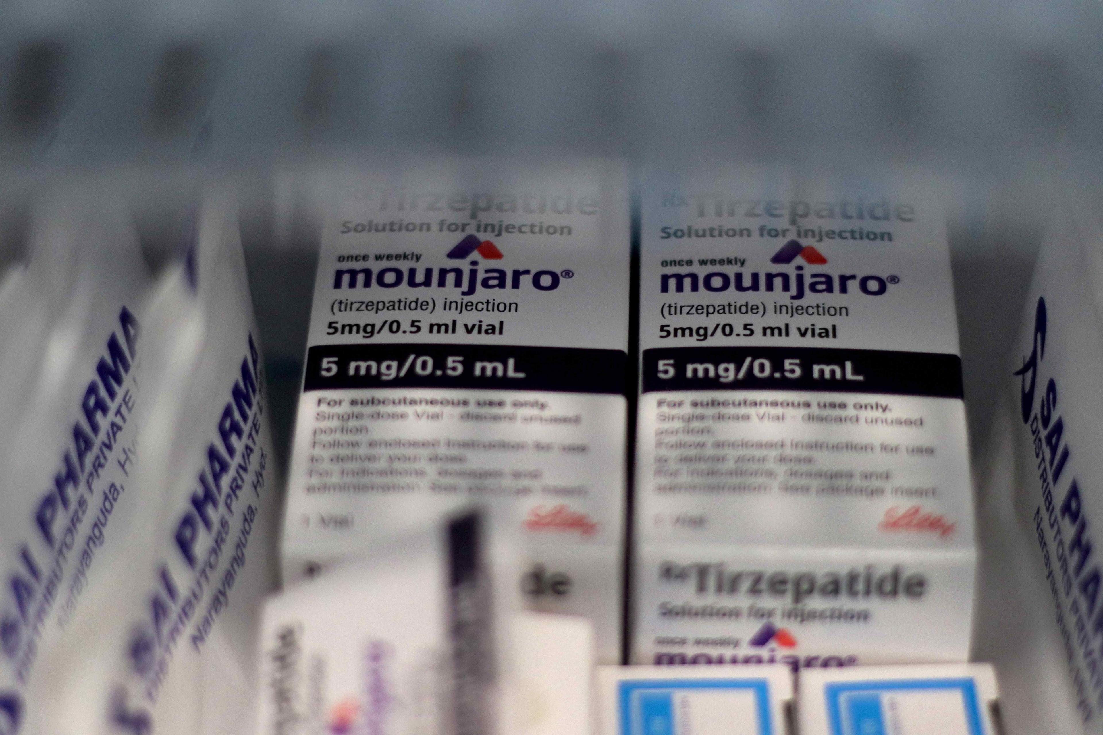 FILE PHOTO: Vials of Eli Lilly's Mounjaro, a tirzepatide injection drug used for treating type 2 diabetes and weight loss, are seen in a fridge at a health clinic in Hyderabad, India, April 14, 2025. REUTERS/Almaas Masood/File Photo