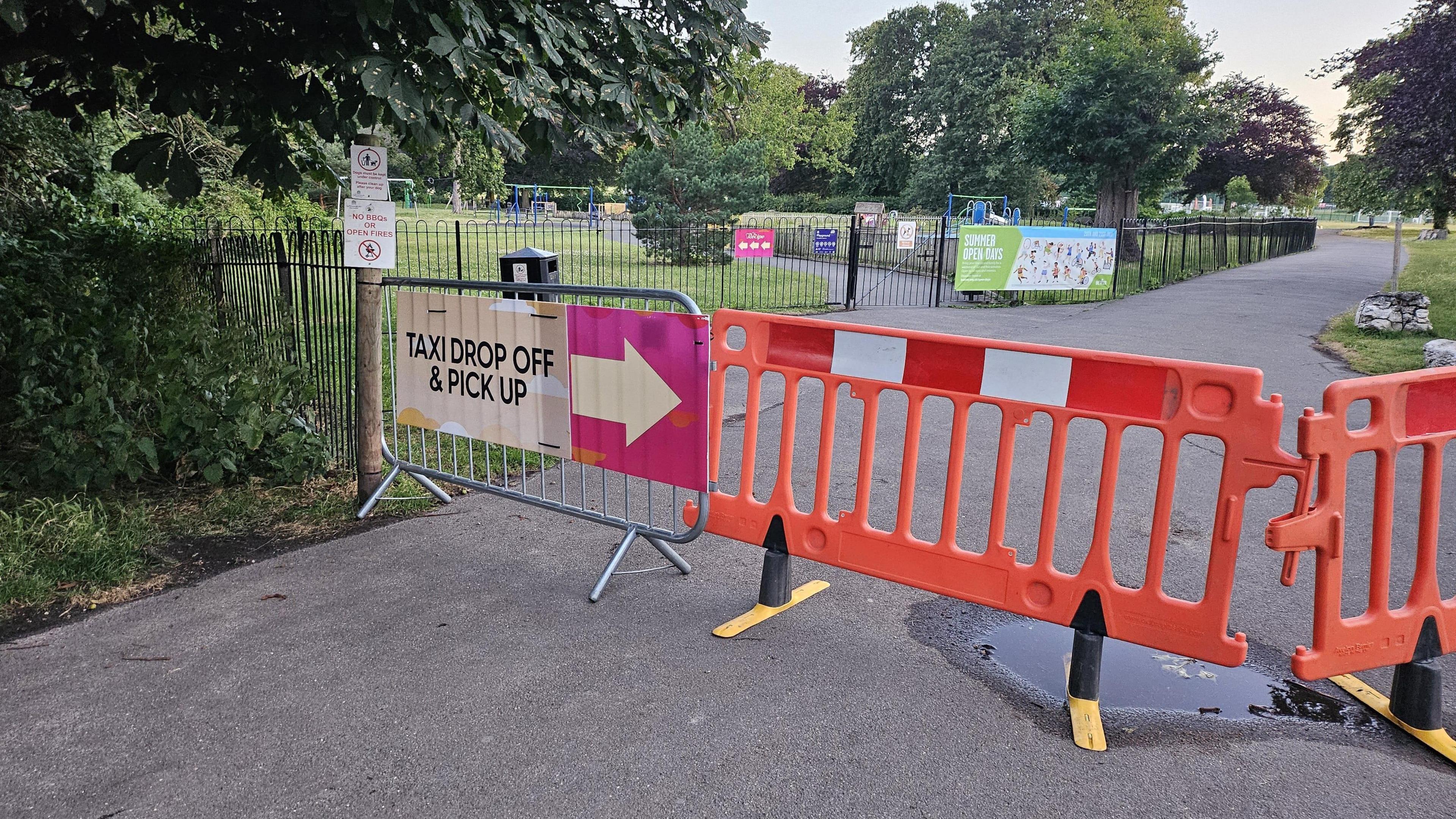 Fencing blocks a pathway in the park