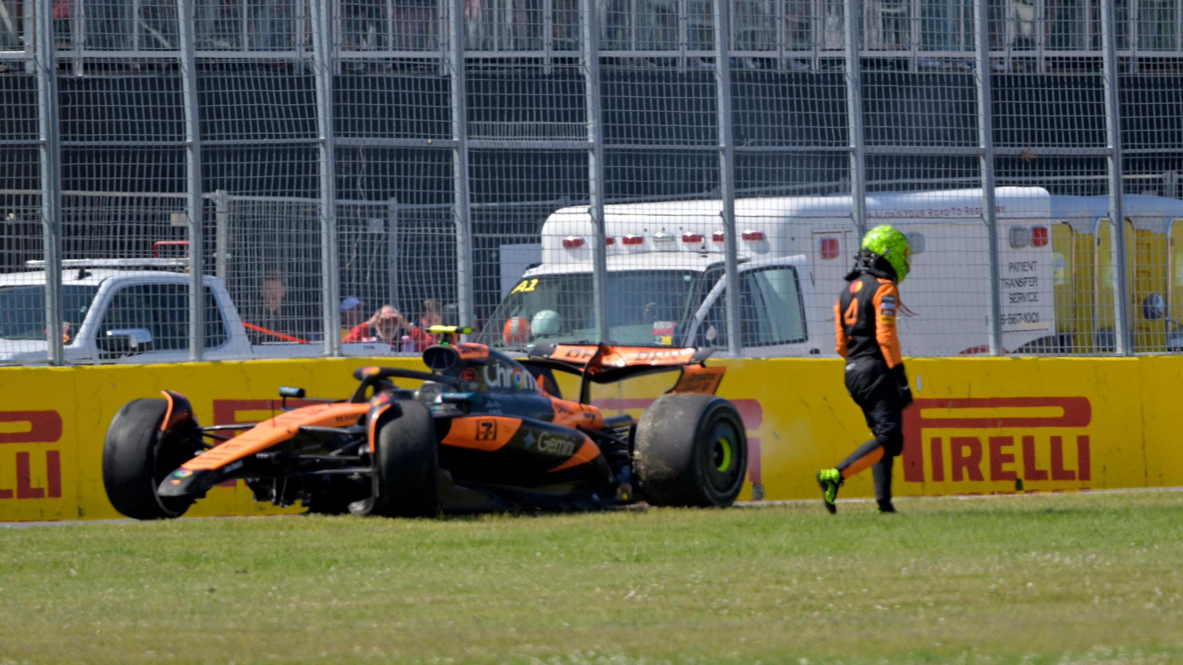 Lando Norris walks away from his McLaren after crashing in Montreal
