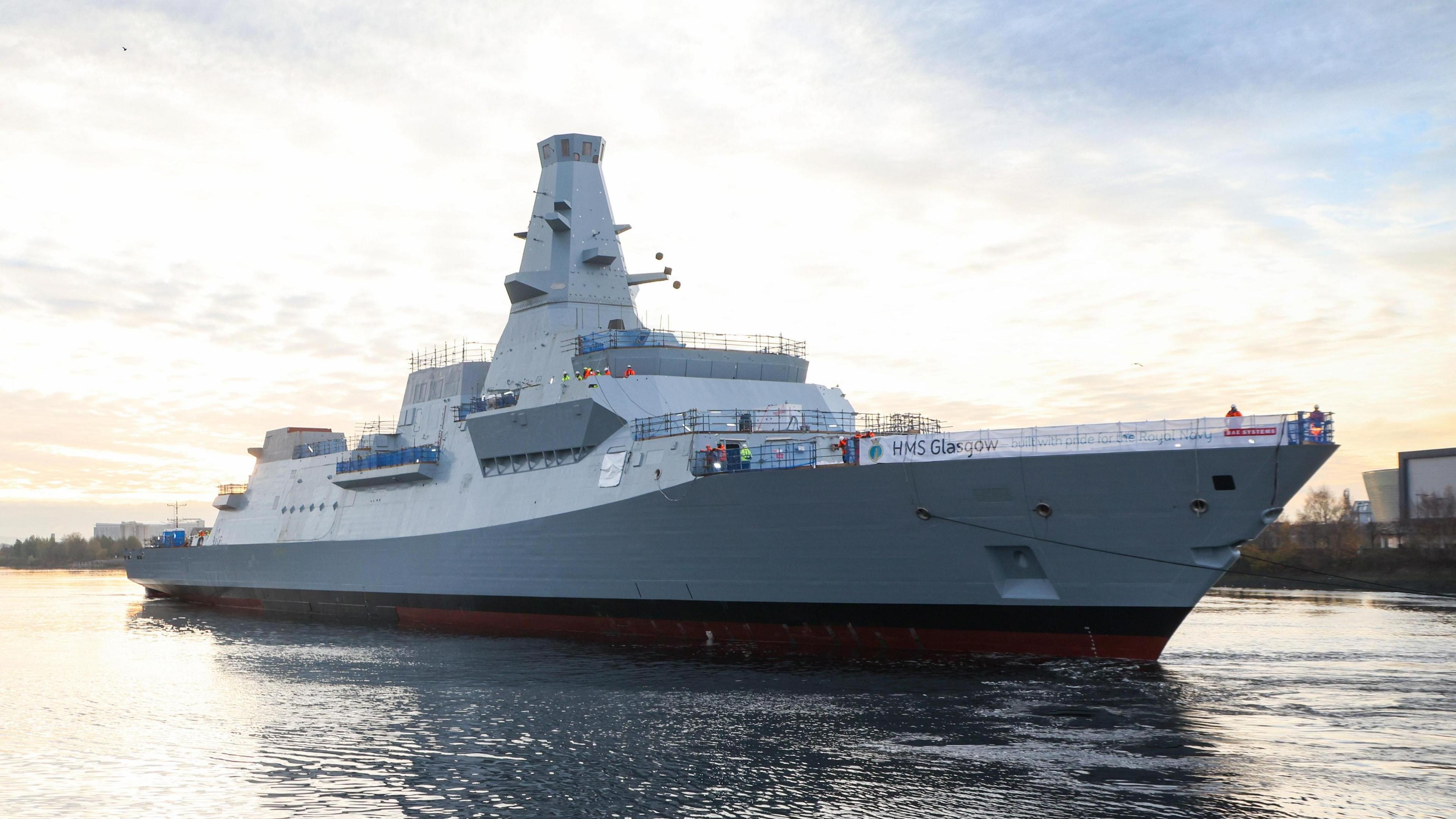 HMS Glasgow, aType 26 Frigate, makes its way to Scotstoun shipyard after being successfully floated on the Clyde.