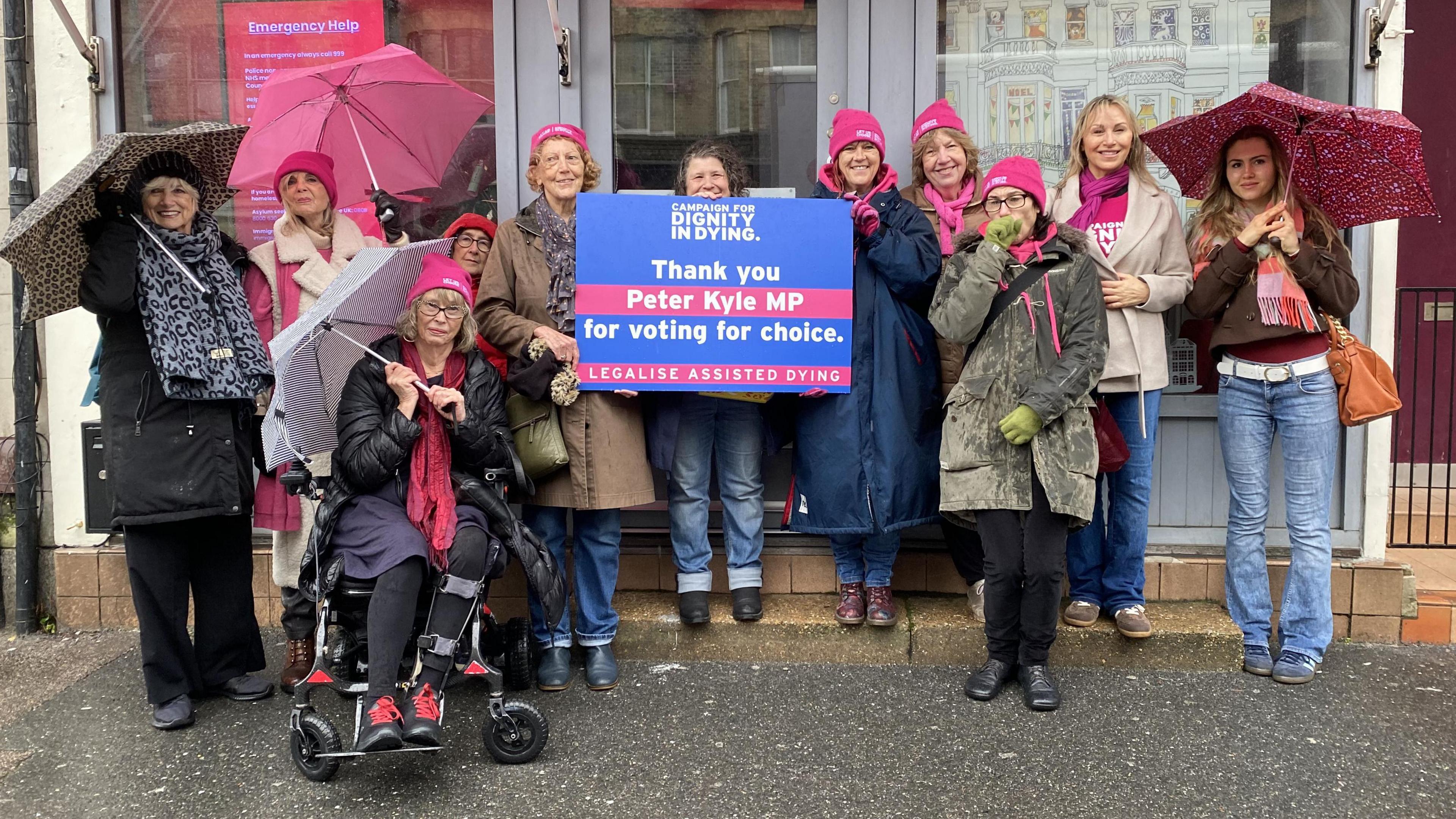 Eleven women in group looking at the camera. They are holding a sign which says "Thank you Peter Kyle MP for voting for choice."