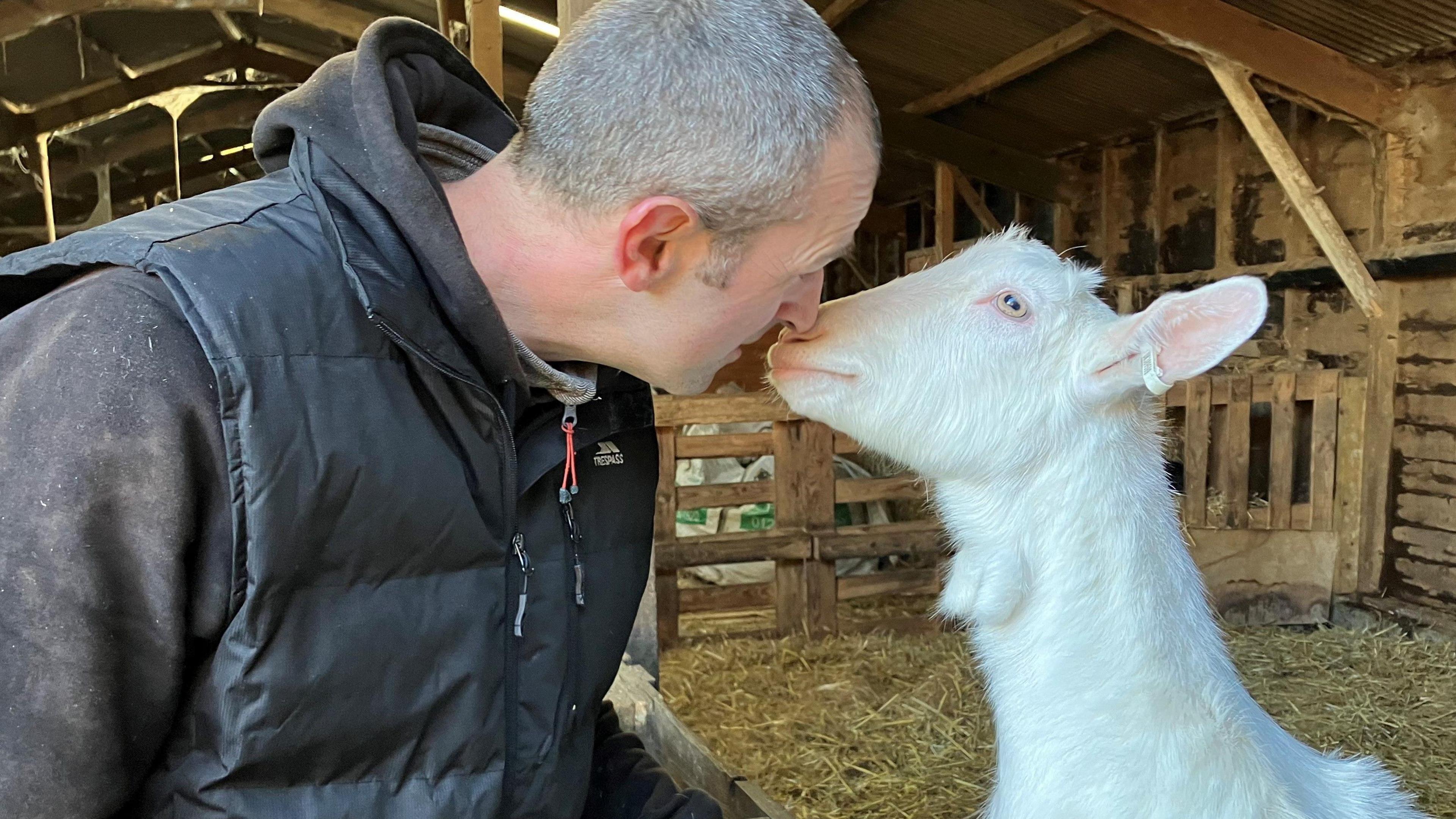 Goat owner with goat 