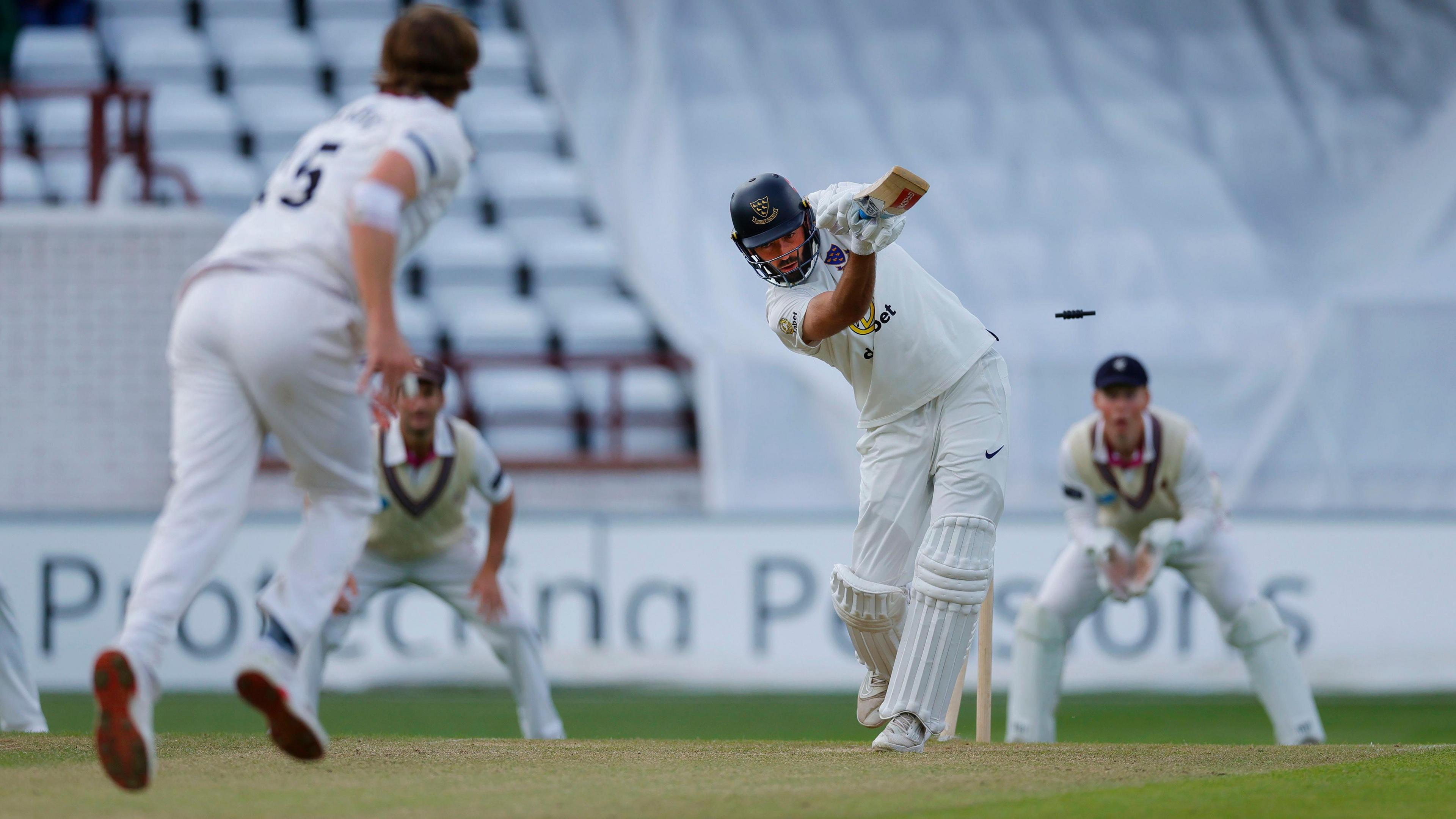 Jack Leaning of Sussex is bowled by Tom Lammonby of Somerset who celebrates.