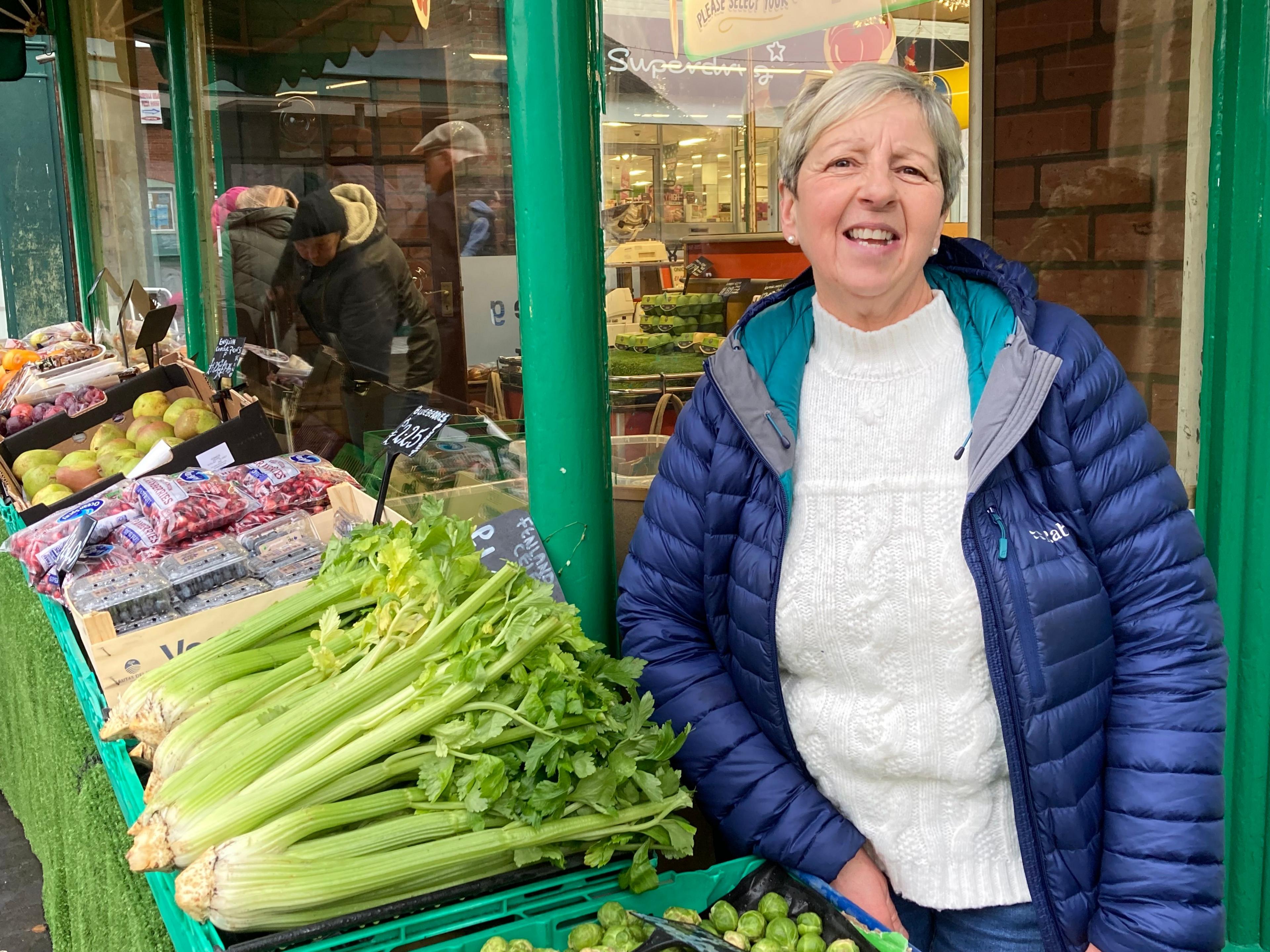 Denise Bonbow standing outside her greengrocer's