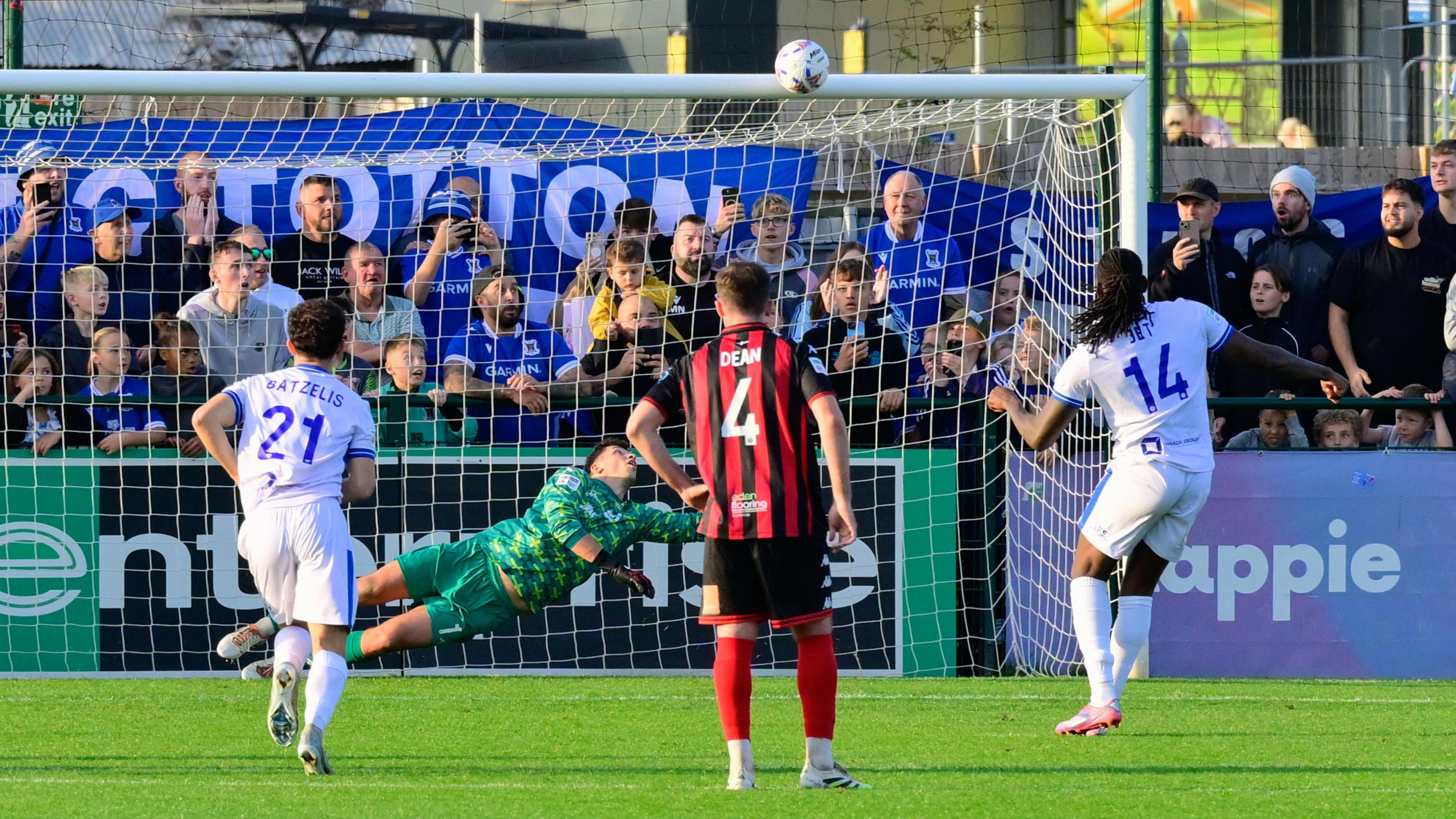 Ex-Arsenal and Ipswich Town striker Jay Emmanuel-Thomas misses a stoppage-time penalty for AFC Totton