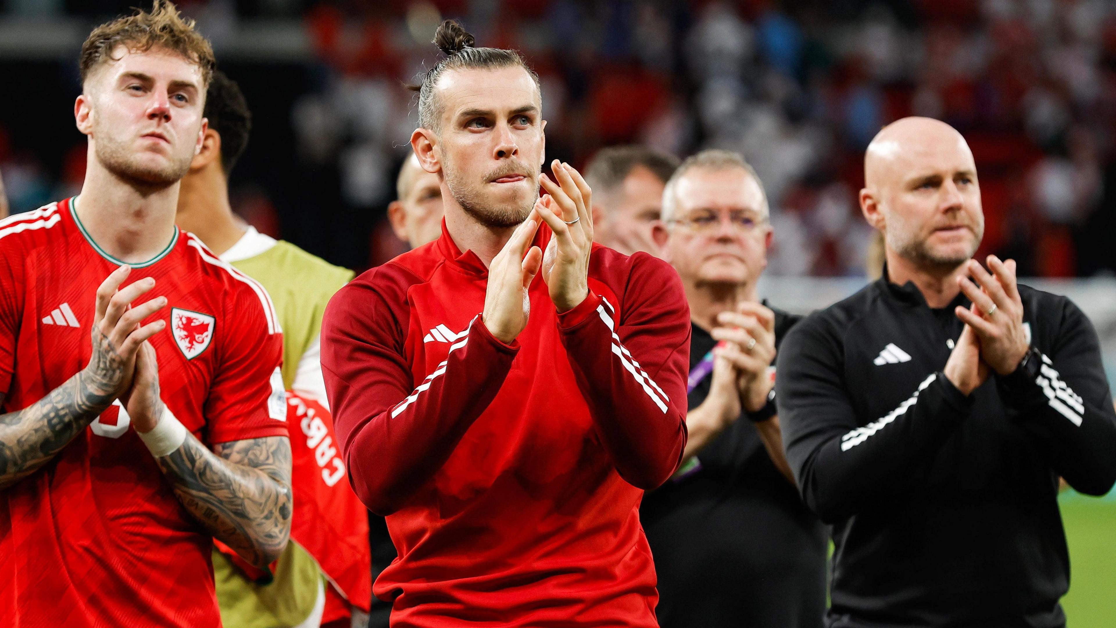 Joe Rodon, Gareth Bale and Rob Page applaud Wales' fans after losing 3-0 to England