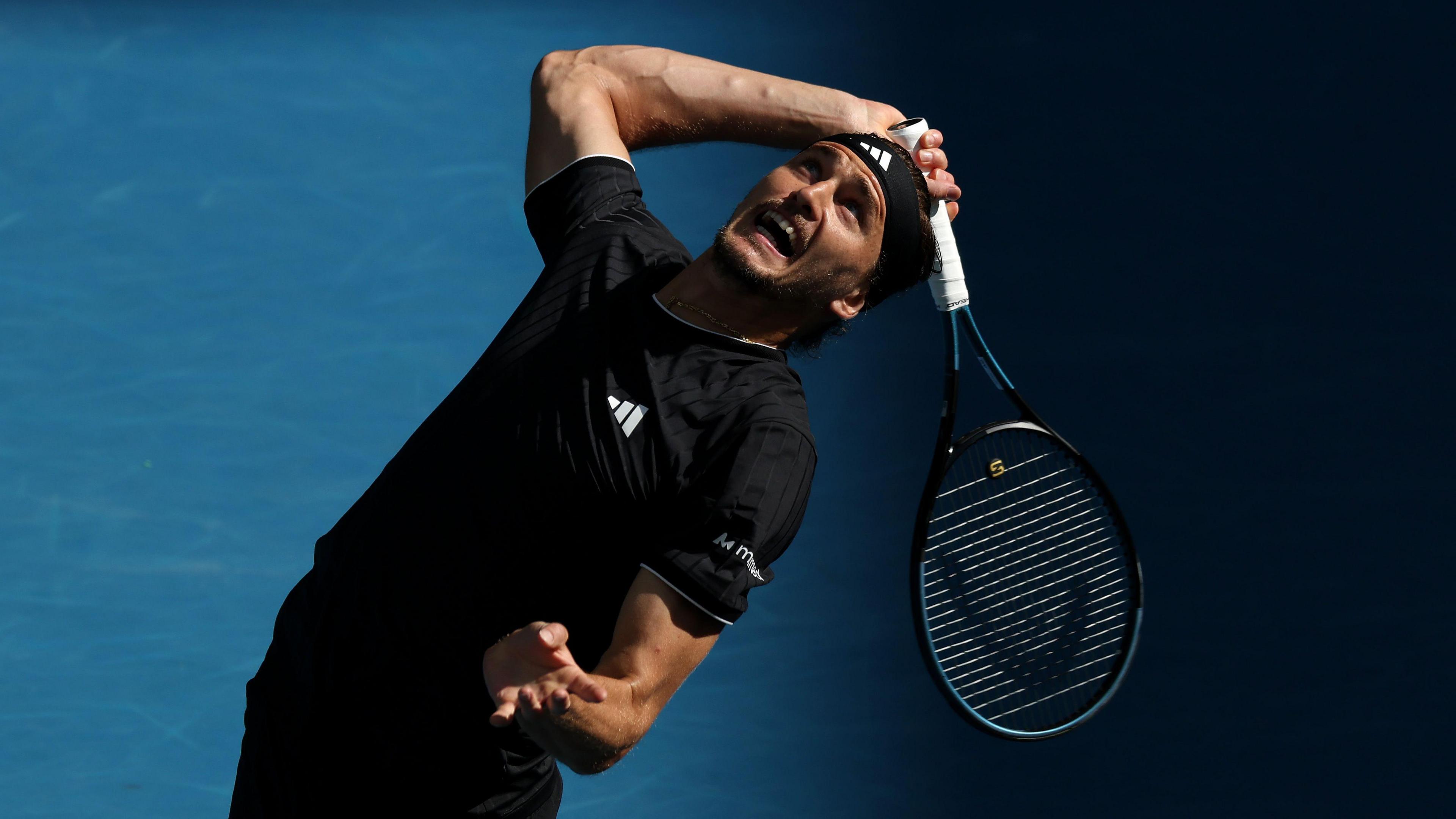 Alexander Zverev serves